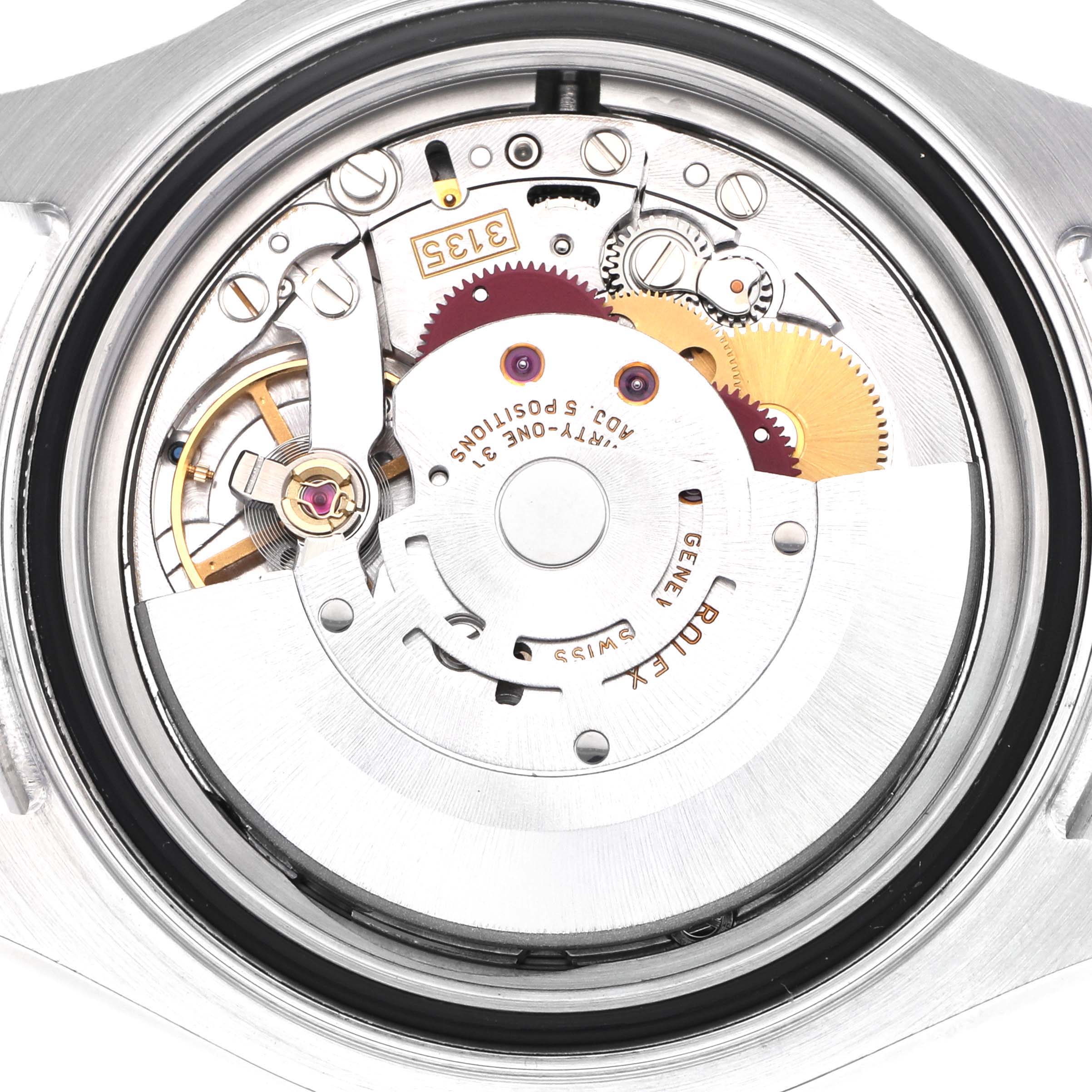 The image shows the movement of a Rolex Yacht-Master 16622 Men's Stainless Steel Silver Dial 16622 Men's Stainless Steel Silver Dial watch from a top-down angle, highlighting gears and mechanical components.
