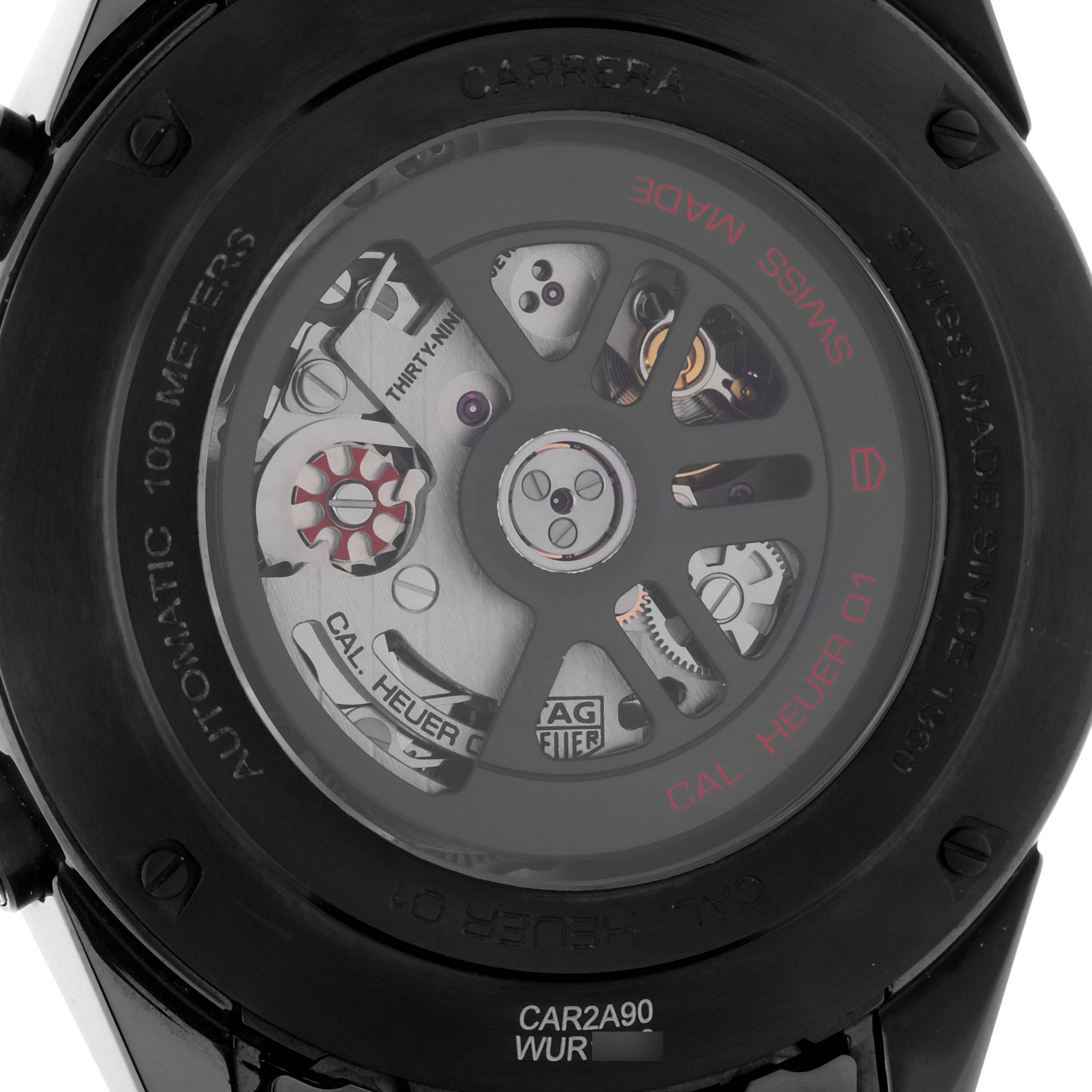 The image shows the exposed back of a Tag Heuer Carrera CAR2A90.FT6071 Men's Ceramic Transparent Dial CAR2A90.FT6071 Men's Ceramic Transparent Dial watch, highlighting its internal mechanisms and branded engravings.