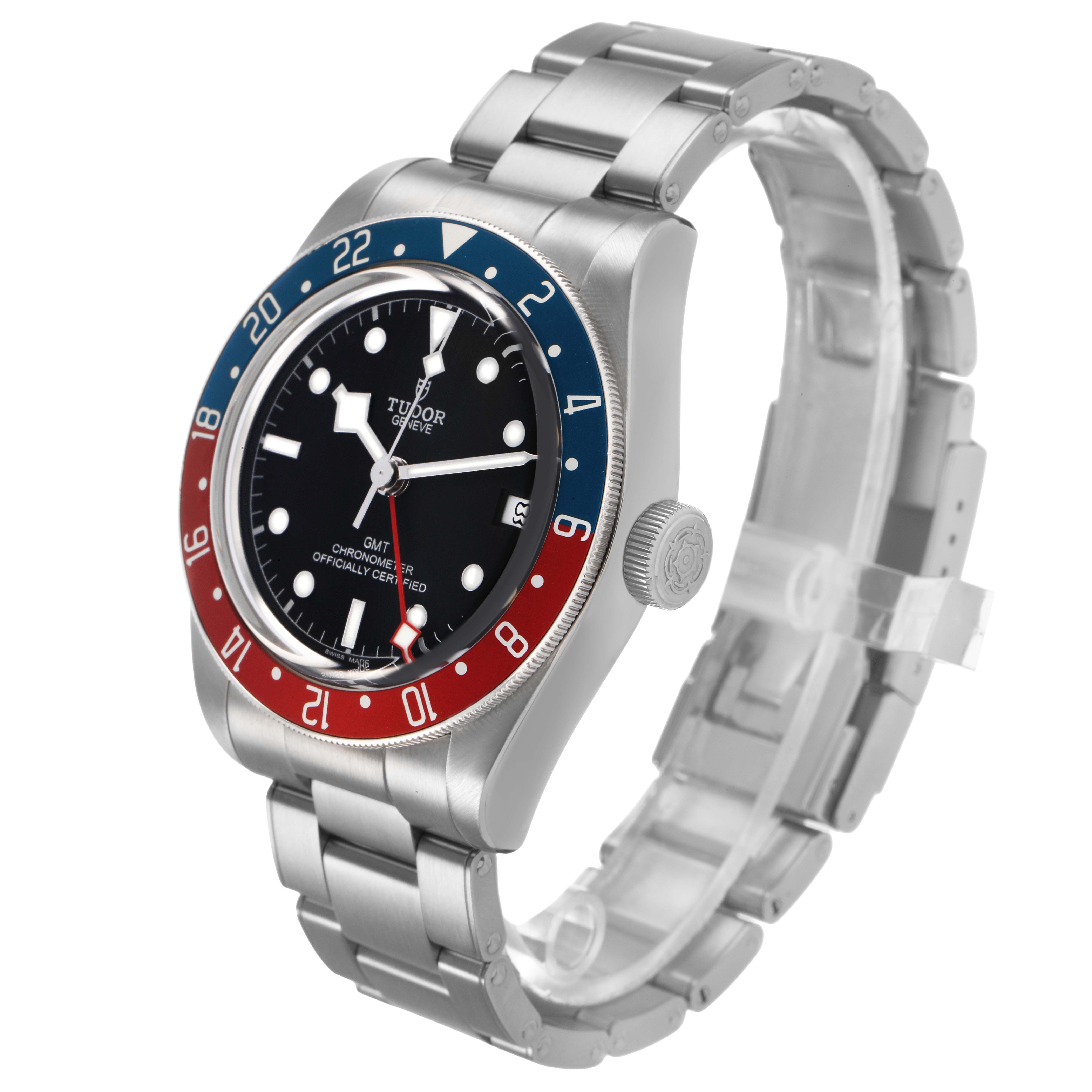 The Tudor Heritage Black Bay 79830RB Men's Stainless Steel Black Dial watch is shown at a three-quarter angle, highlighting the bezel, face, crown, and bracelet.