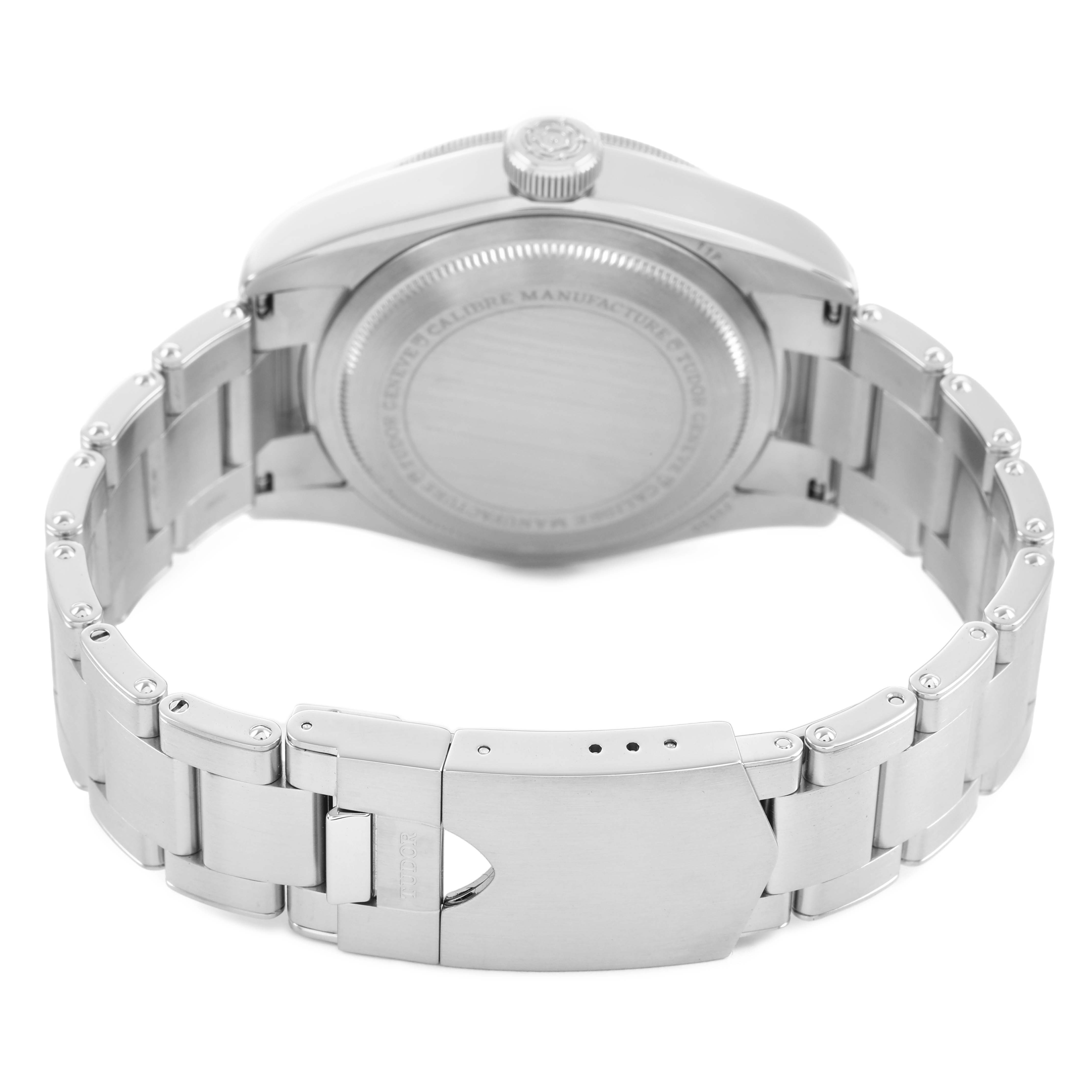 The image shows the back case and stainless steel bracelet of the Tudor Heritage Black Bay 79830RB Men's Stainless Steel Black Dial watch, viewed from the rear angle.