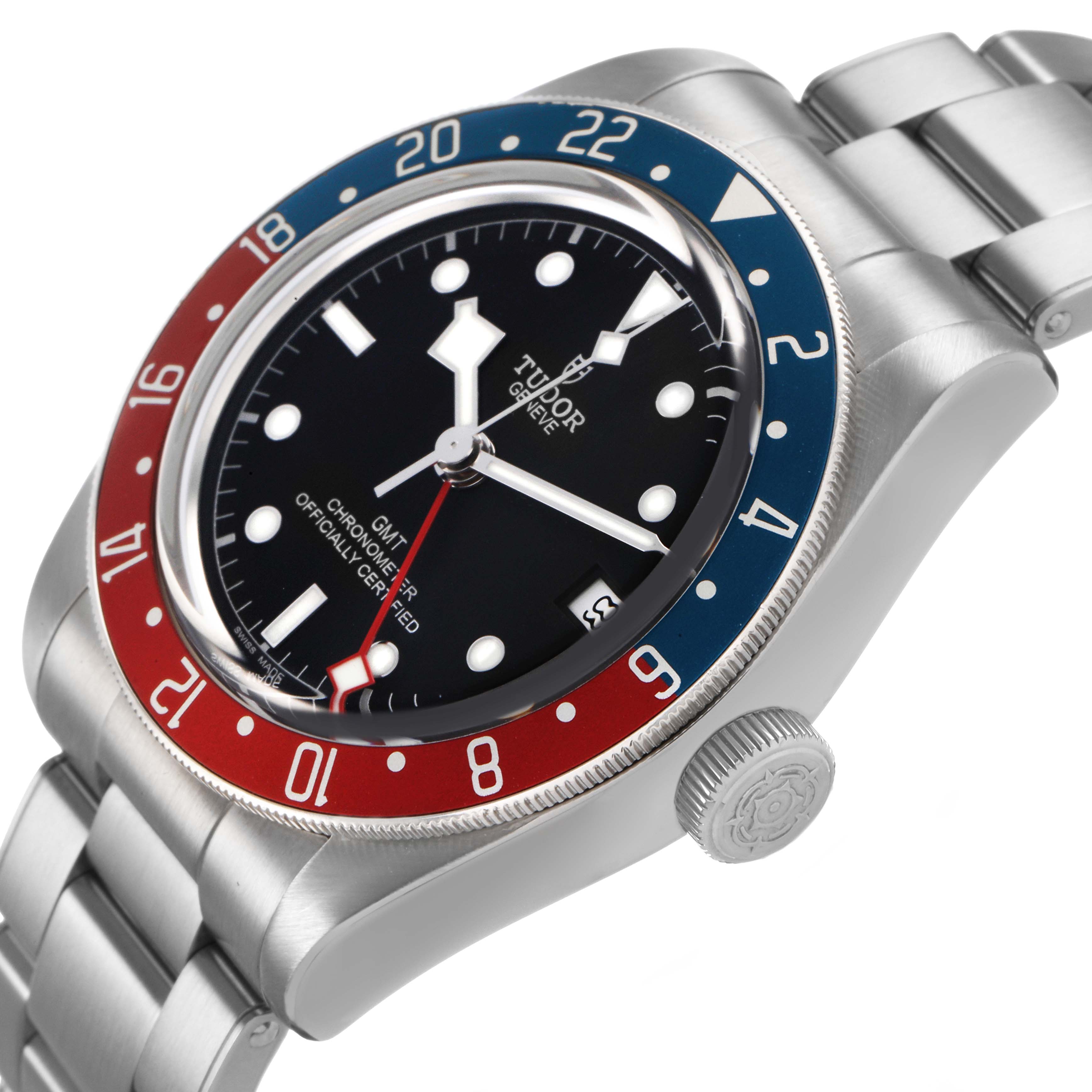The Tudor Heritage Black Bay 79830RB Men's Stainless Steel Black Dial watch is shown at an angle displaying the dial, bezel, bracelet, and crown on the side.