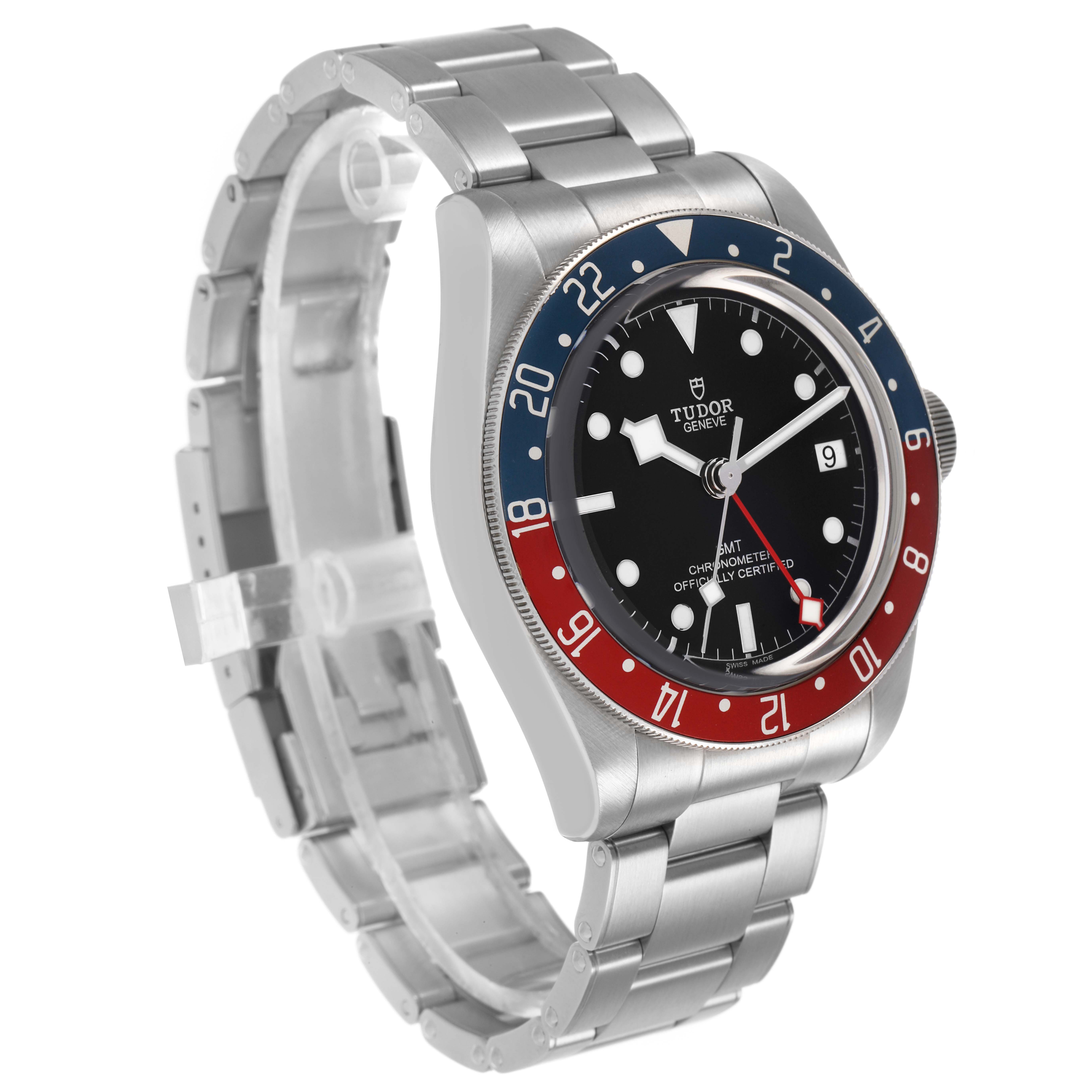 The Tudor Heritage Black Bay 79830RB Men's Stainless Steel Black Dial watch is shown at a three-quarter angle, highlighting its bezel, dial, and metal bracelet.