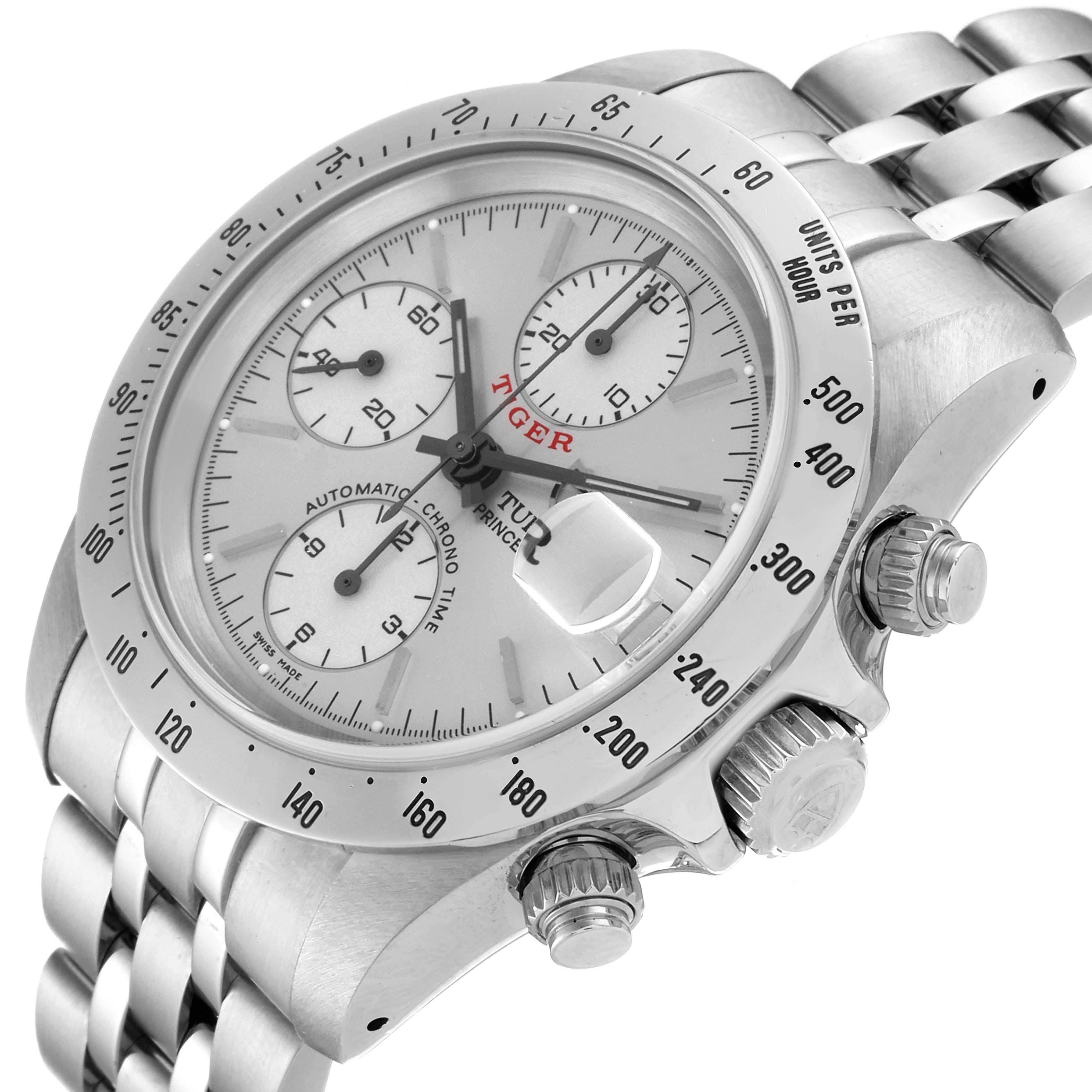 The Tudor Prince watch is shown at an angled close-up, featuring its dial, bezel, chronograph subdials, crown, and bracelet.