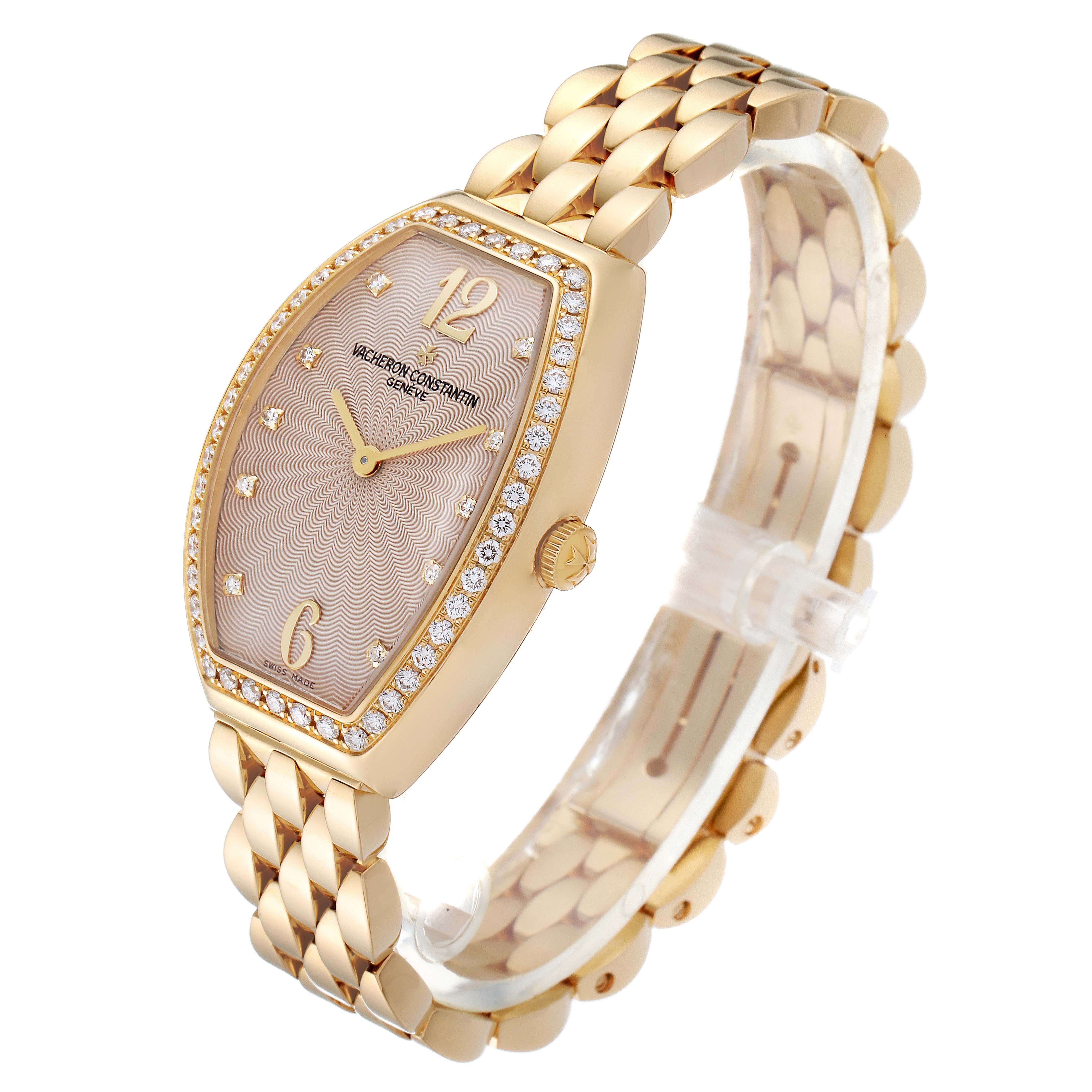 The image shows a Vacheron Constantin Egerie 25540/344J Women
s Rose Gold Silver Dial 25540/344J Women
s Rose Gold Silver Dial model watch angled to display its gold case, diamond bezel, and bracelet.
