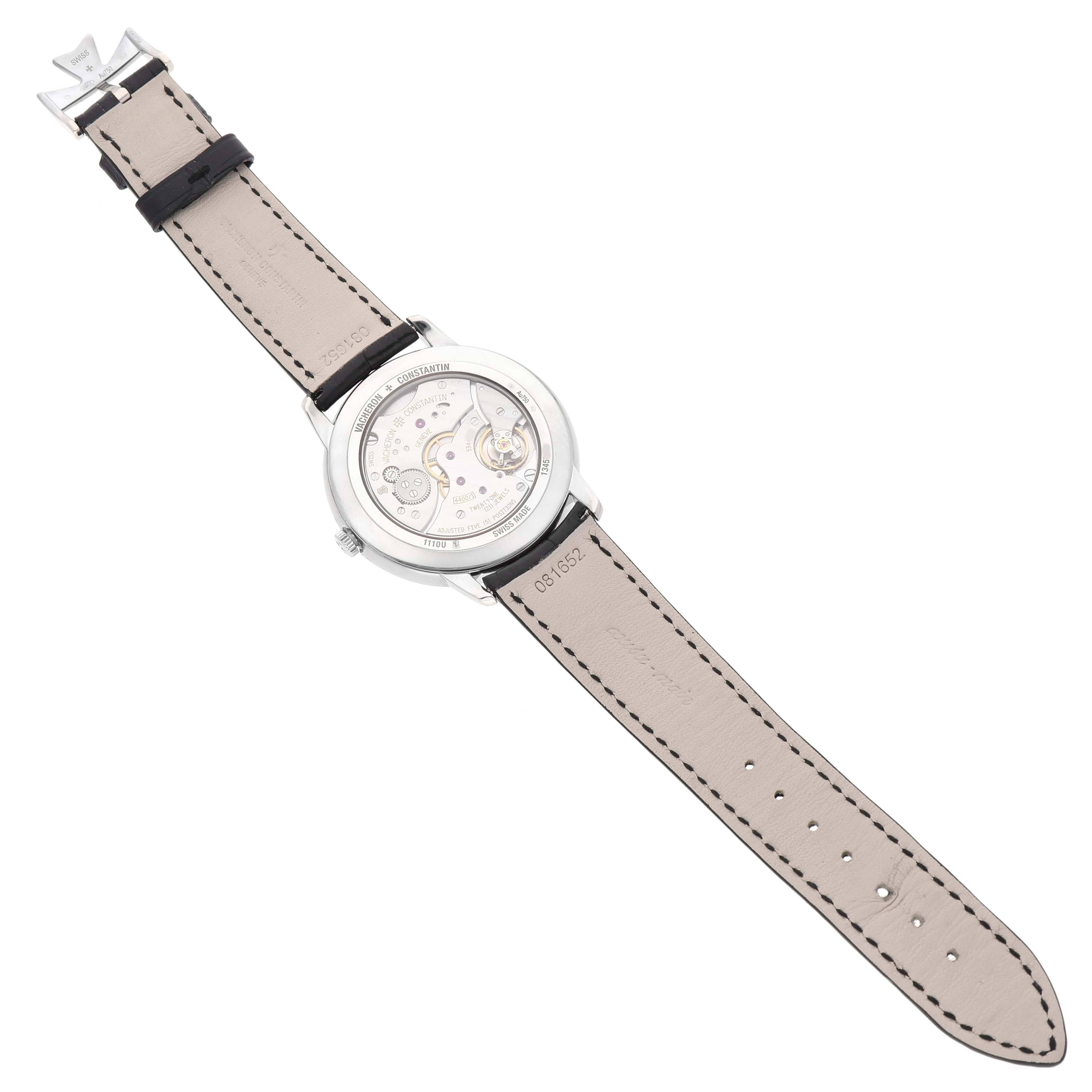 The image shows the back of a Vacheron Constantin Patrimony 1110U Men's White Gold Silver Dial watch, displaying its movement and leather strap.