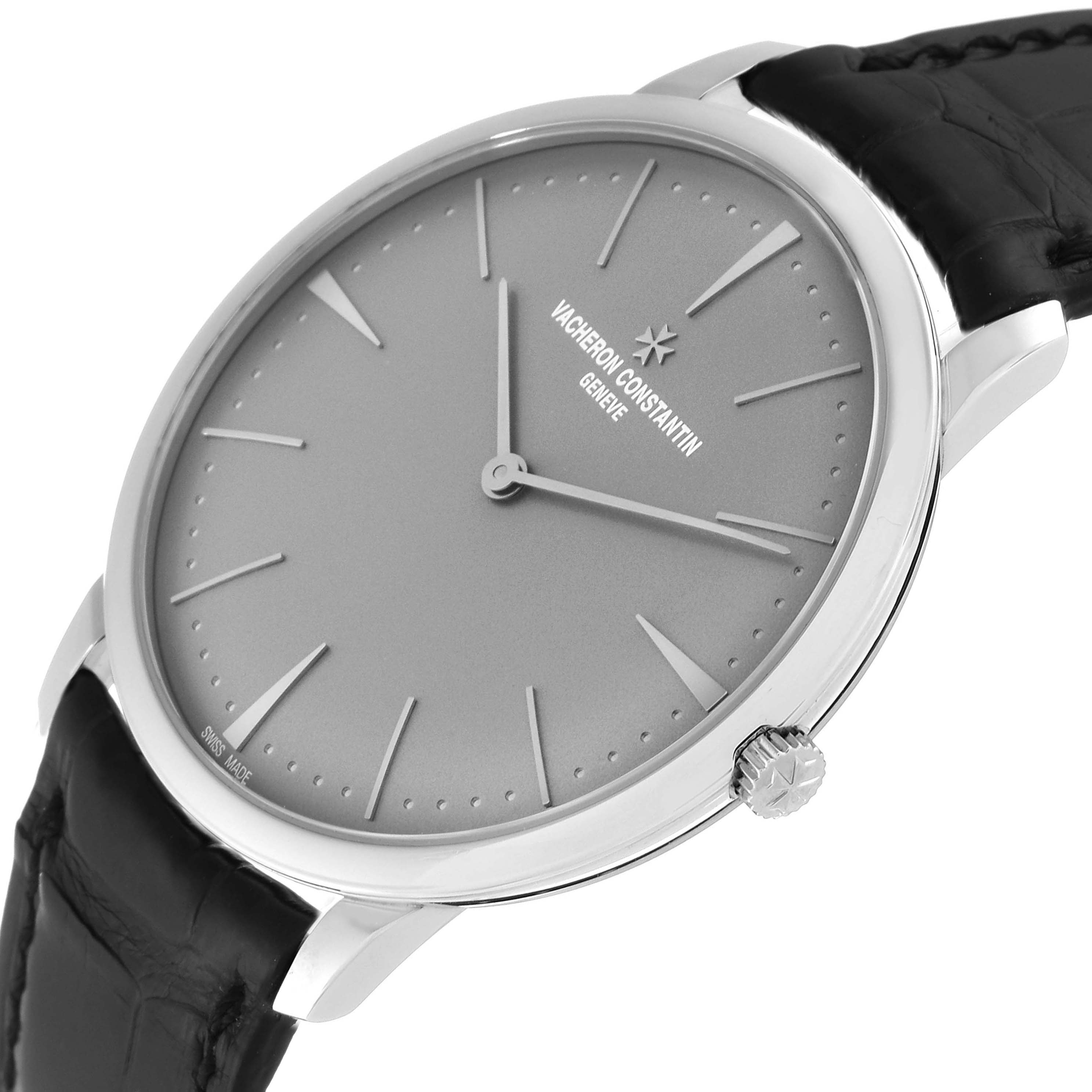 The image shows a side angle of a Vacheron Constantin Patrimony 81180/000P-9539 Men's Platinum Grey Dial 81180/000P-9539 Men's Platinum Grey Dial watch, highlighting the dial, crown, and part of the leather strap.