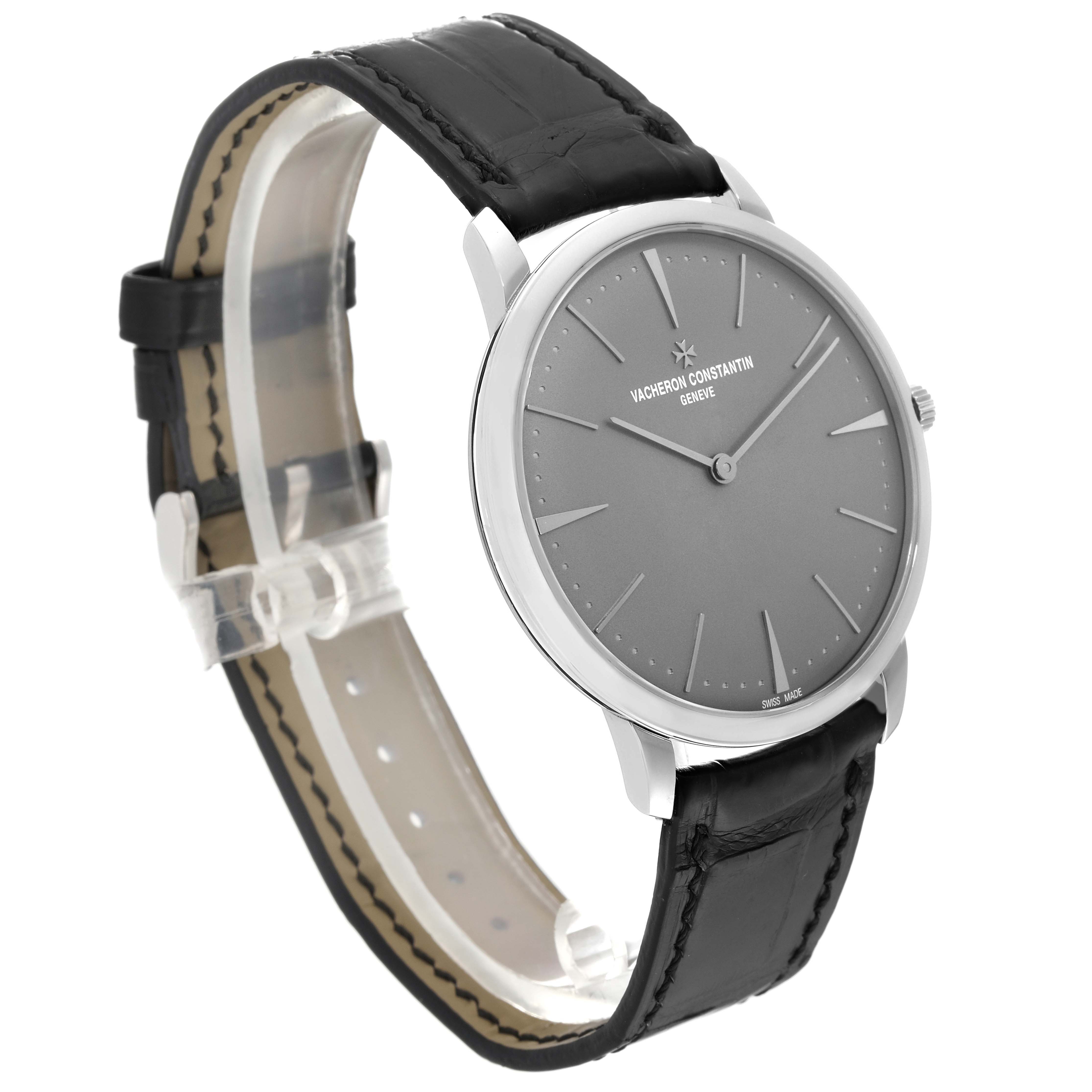 The image shows a Vacheron Constantin Patrimony 81180/000P-9539 Men's Platinum Grey Dial 81180/000P-9539 Men's Platinum Grey Dial watch at an angled side view, displaying its face and black leather strap.