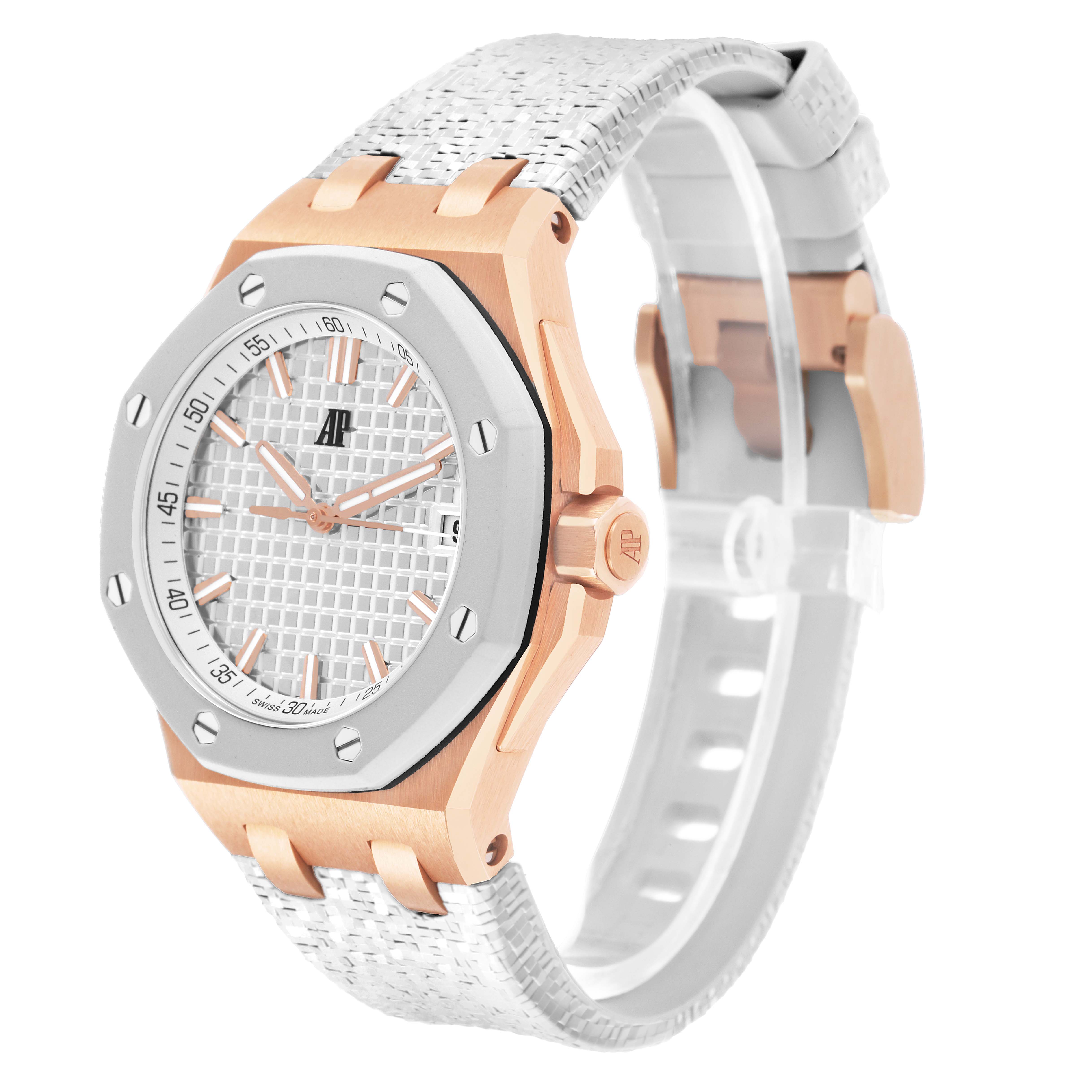 The Audemars Piguet Royal Oak Offshore 77605OK.OO.A101CA.01 Women's Rose Gold White Dial watch is shown from a front-side angle, highlighting its face, bezel, and strap.