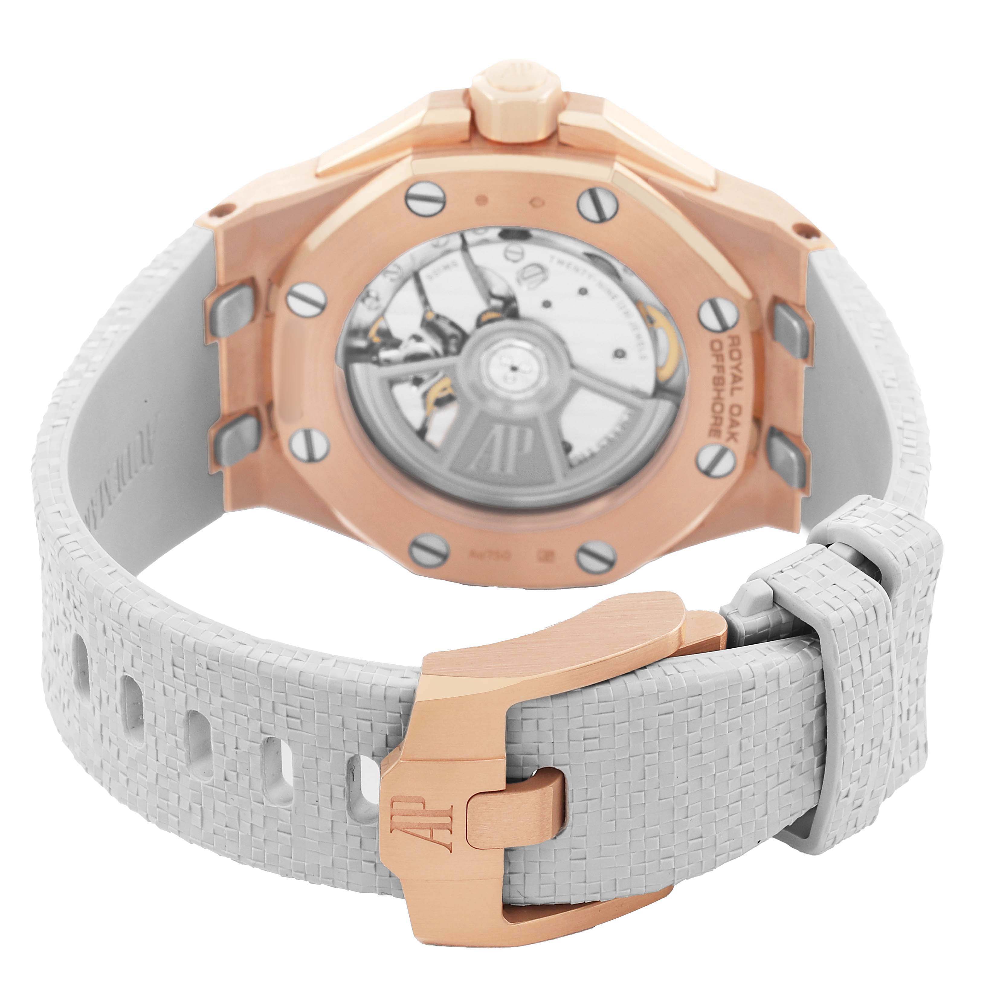 The image shows the back of an Audemars Piguet Royal Oak Offshore 77605OK.OO.A101CA.01 Women's Rose Gold White Dial, highlighting the movement and clasp.