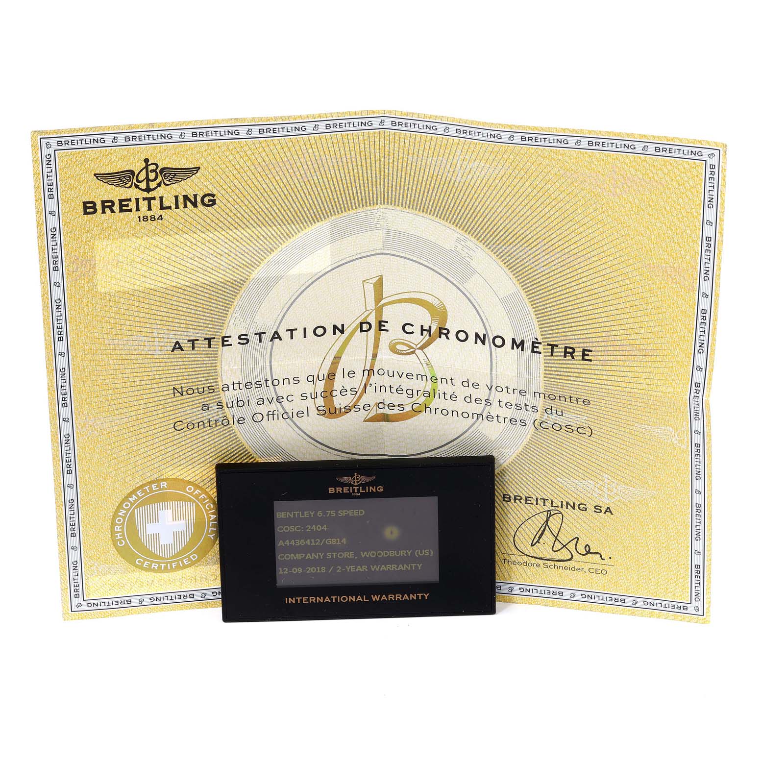 The image shows the warranty card and chronometer certificate for a Bentley model by Breitling, both from a frontal view.