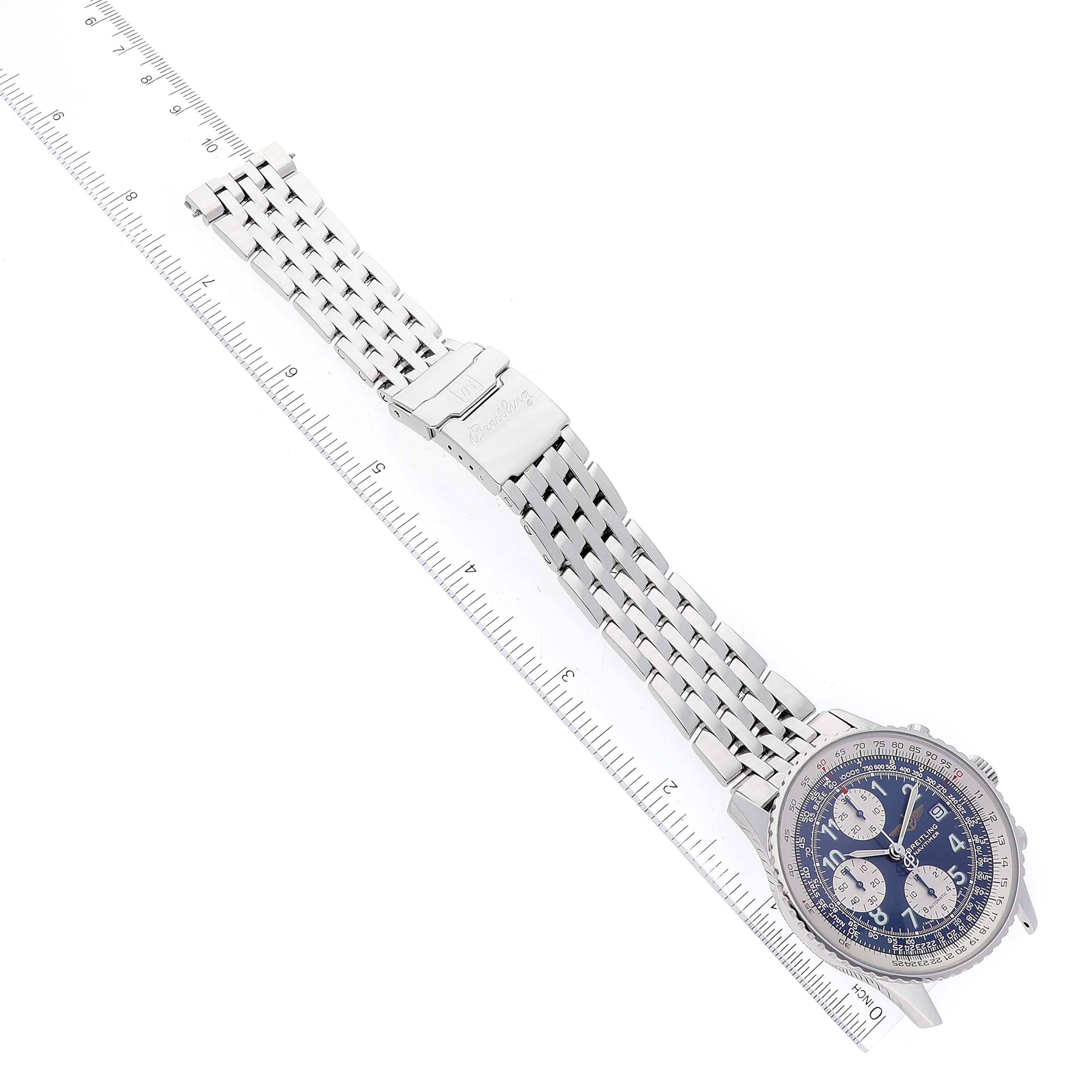 The Breitling Navitimer A13322 Men
s Stainless Steel Blue Dial A13322 Men
s Stainless Steel Blue Dial watch is shown laid flat, displaying its full bracelet, clasp, and face with a blue dial and chronographs.
