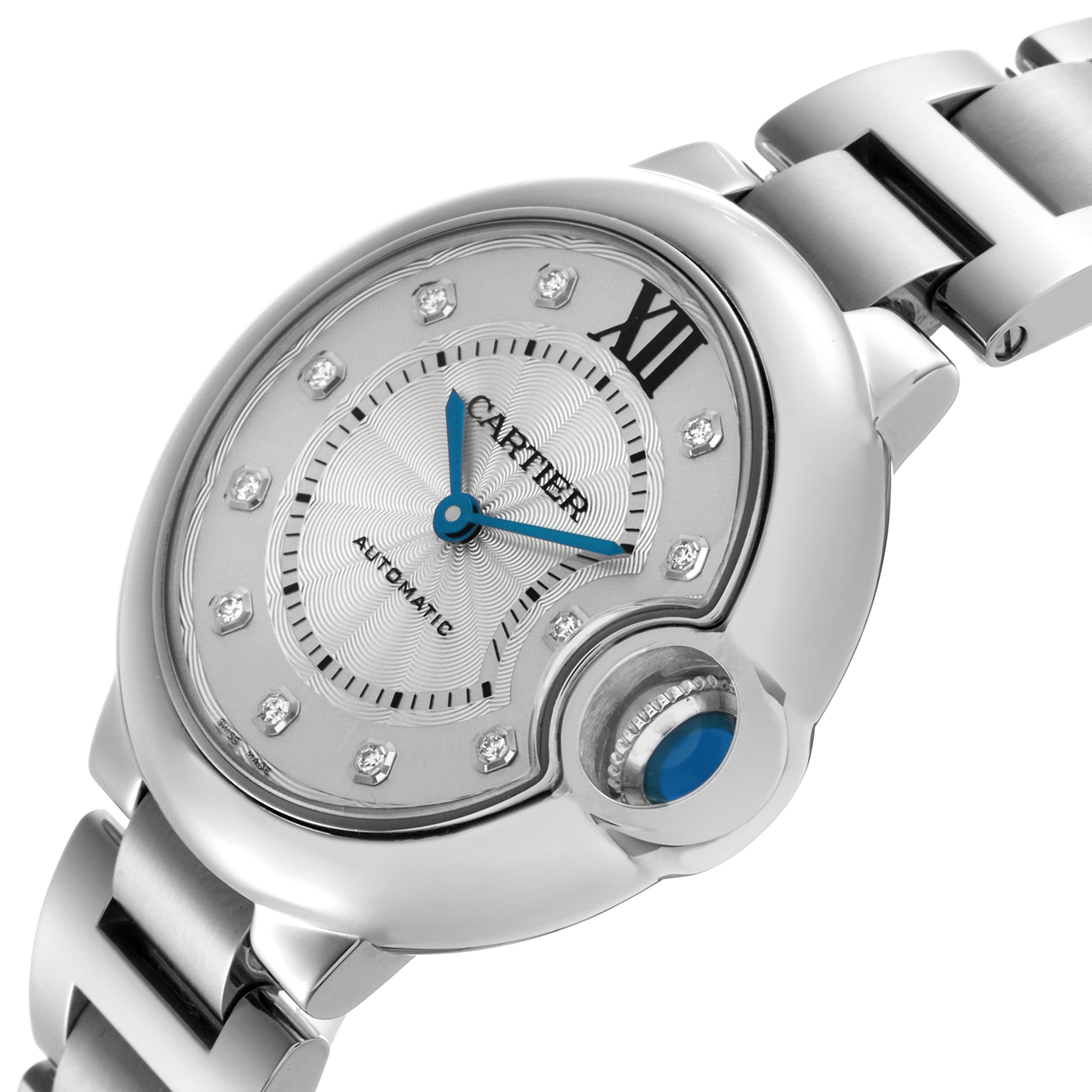 The Cartier Ballon Bleu WE902074 Women's Stainless Steel Silver Dial WE902074 Women's Stainless Steel Silver Dial watch is shown from an angled top view, highlighting its dial, blue hands, and distinctive crown.