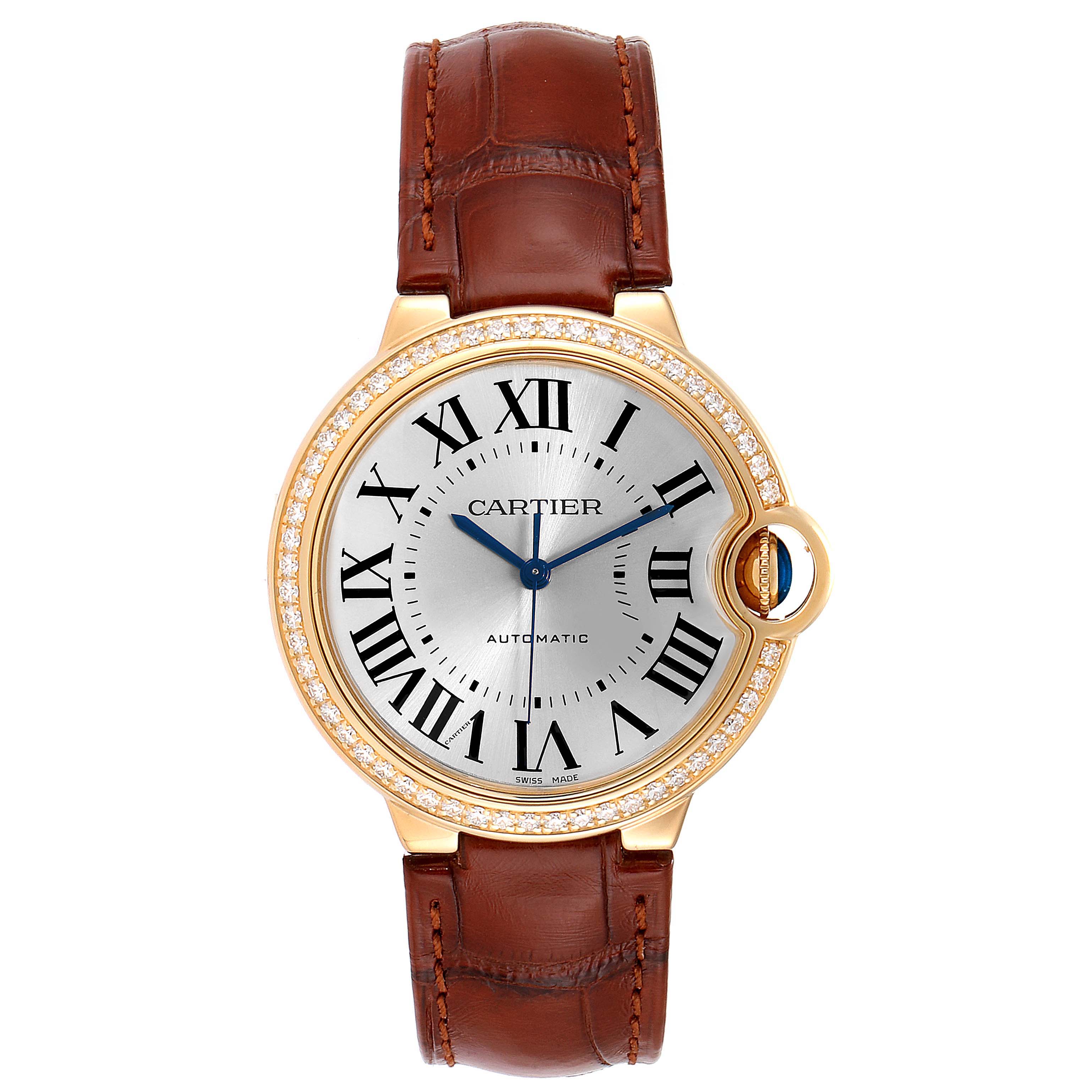 This is a front view of a Cartier Ballon Bleu WE900451 Women
s Yellow Gold Silver Dial WE900451 Women
s Yellow Gold Silver Dial watch showing the face, leather strap, and diamond-encrusted bezel.