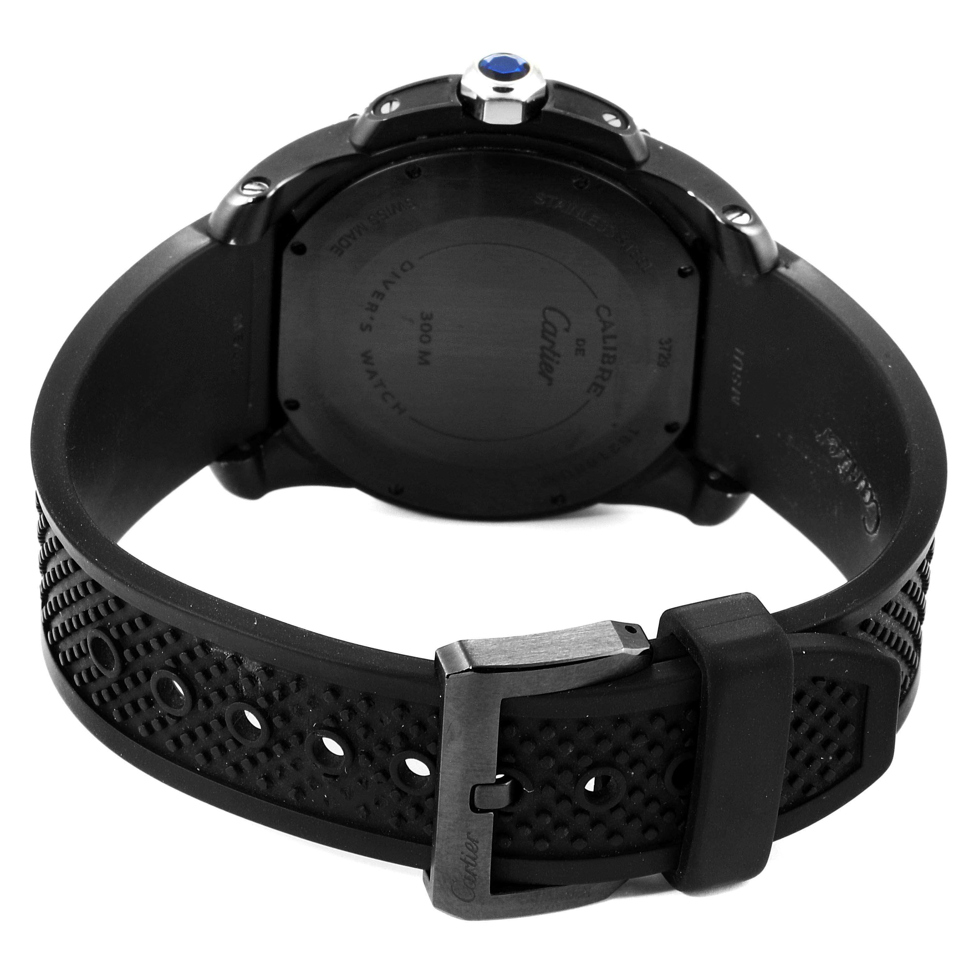 The image shows the back view of a Calibre de Cartier watch by Cartier, highlighting its case back, strap, and buckle.