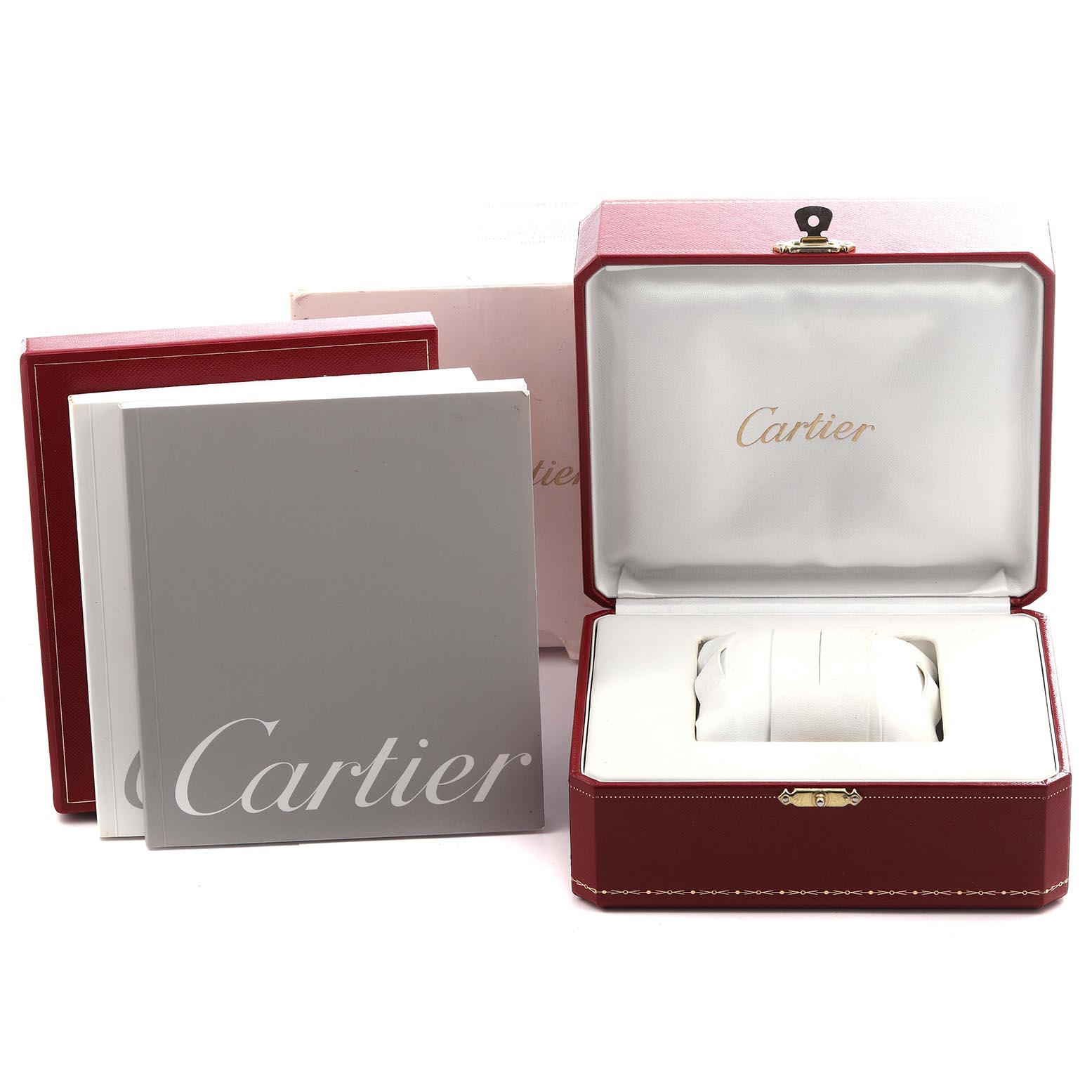 The image shows the packaging and accessories for a Cartier Santos W2SA0009 Men's Steel and Gold (two tone) Silver Dial W2SA0009 Men's Steel and Gold (two tone) Silver Dial watch, including the box and manuals.