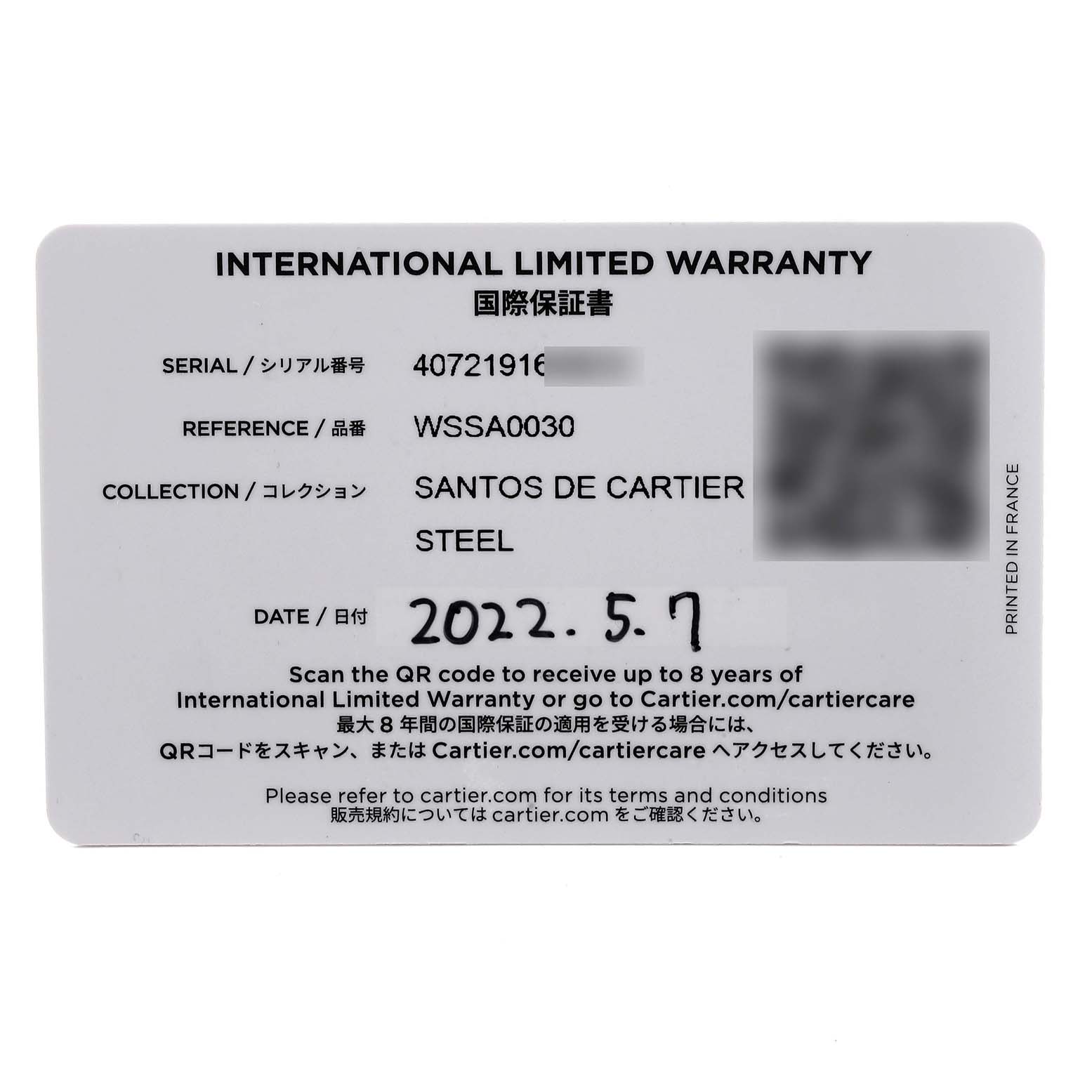 The image shows an international limited warranty card for the Santos de Cartier watch model.