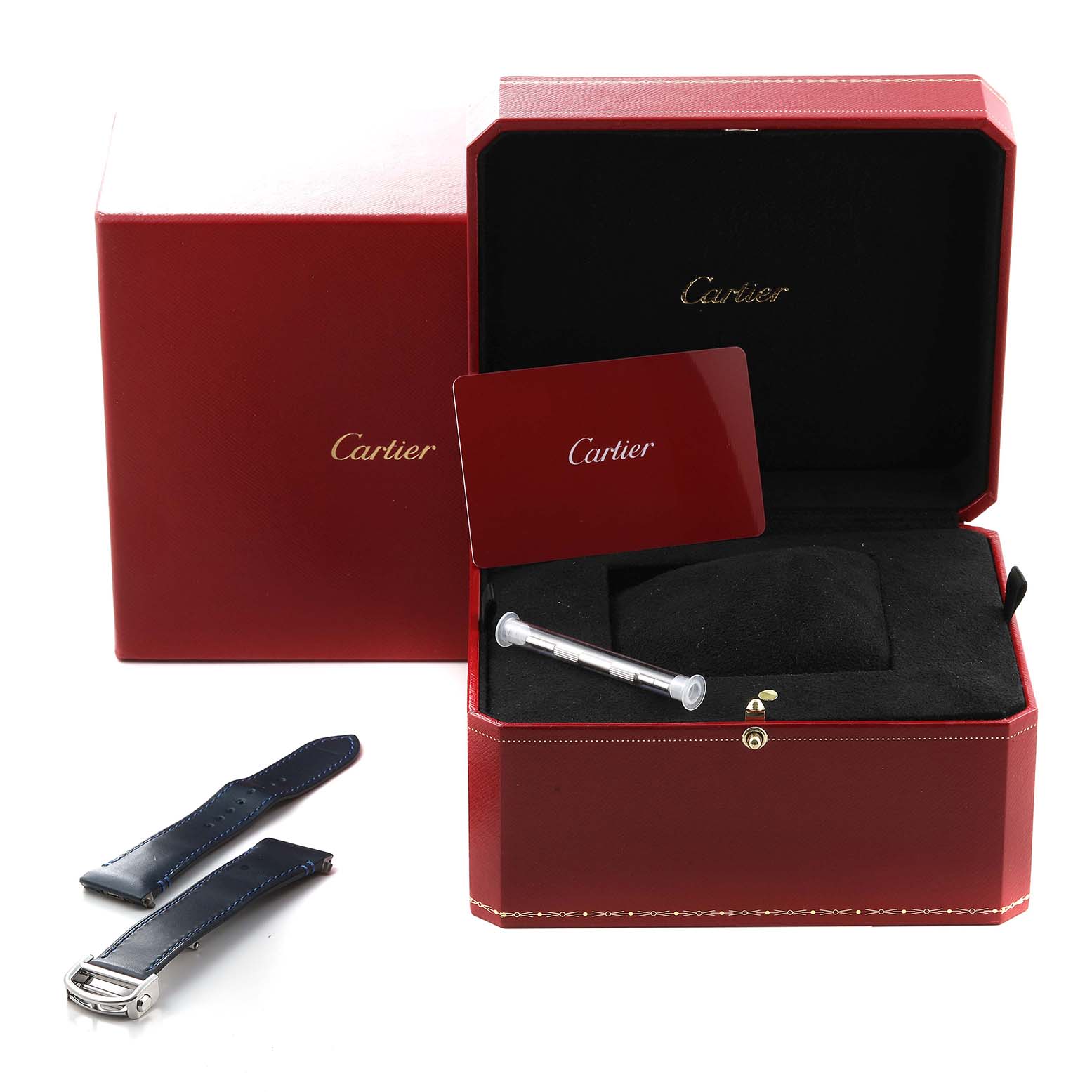 This image shows the packaging, a tool, and extra straps for the Cartier Santos WSSA0030 Men's Stainless Steel Blue Dial WSSA0030 Men's Stainless Steel Blue Dial model watch.