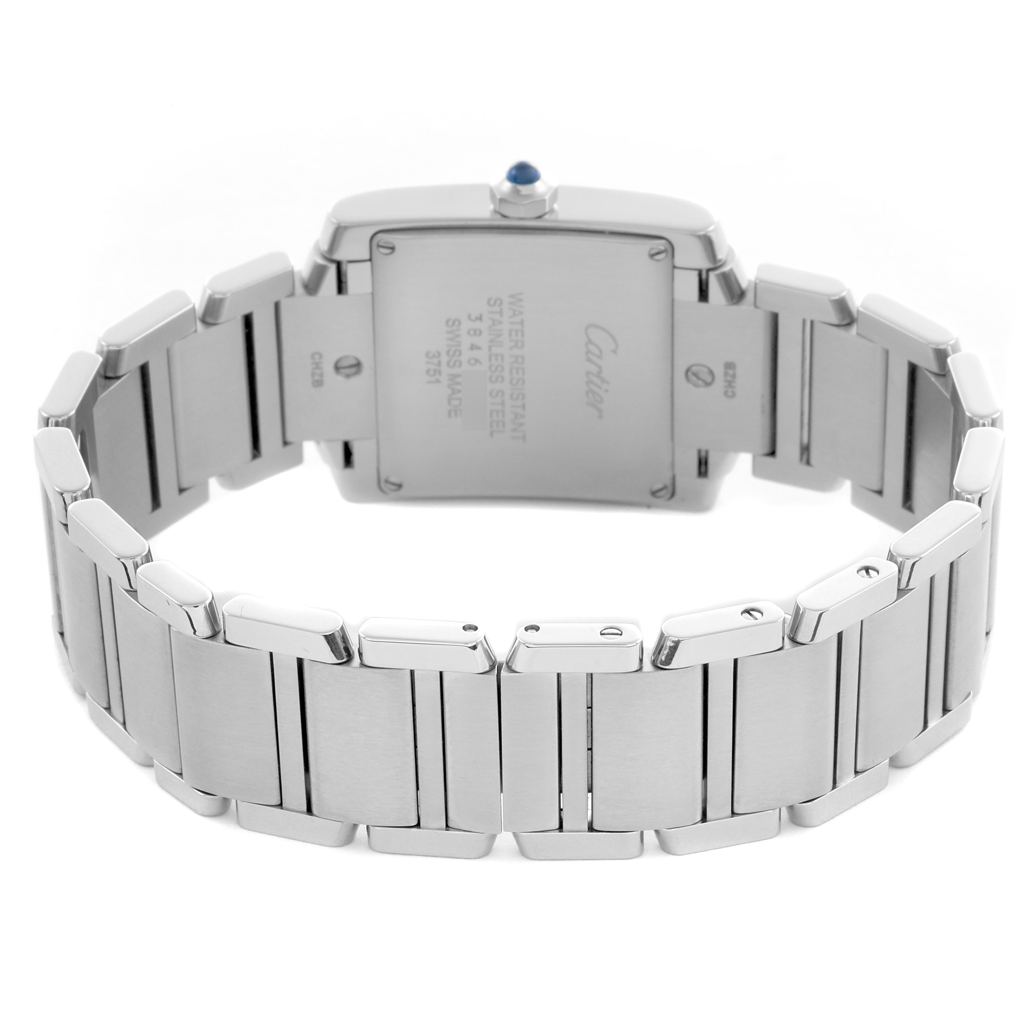 The Cartier Tank Française watch is shown from the back, highlighting the stainless steel bracelet and case back details.