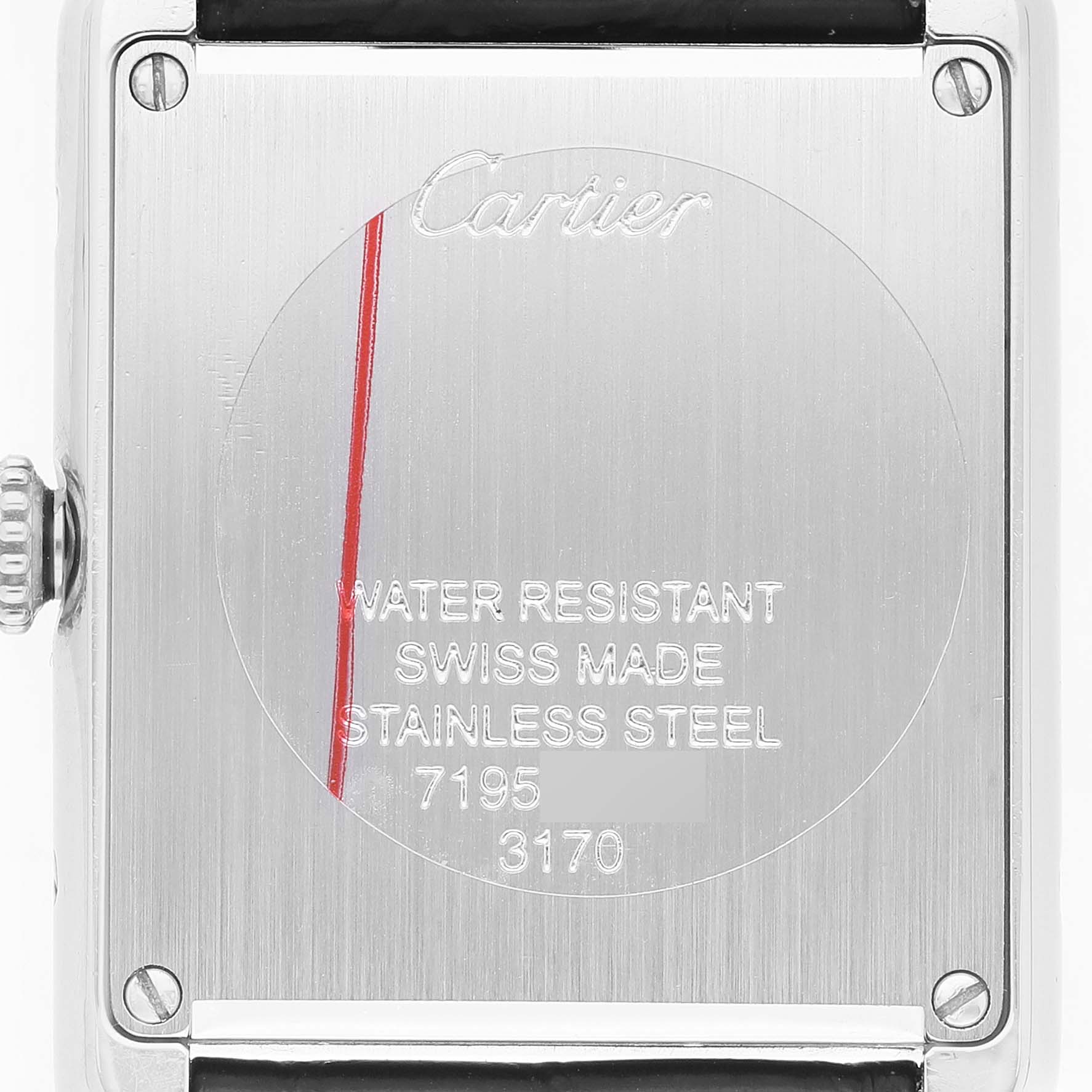 The image shows the back of the Cartier Tank Solo WSTA0028 Men's Stainless Steel Silver Dial watch, displaying the brand engraving and water resistance details.