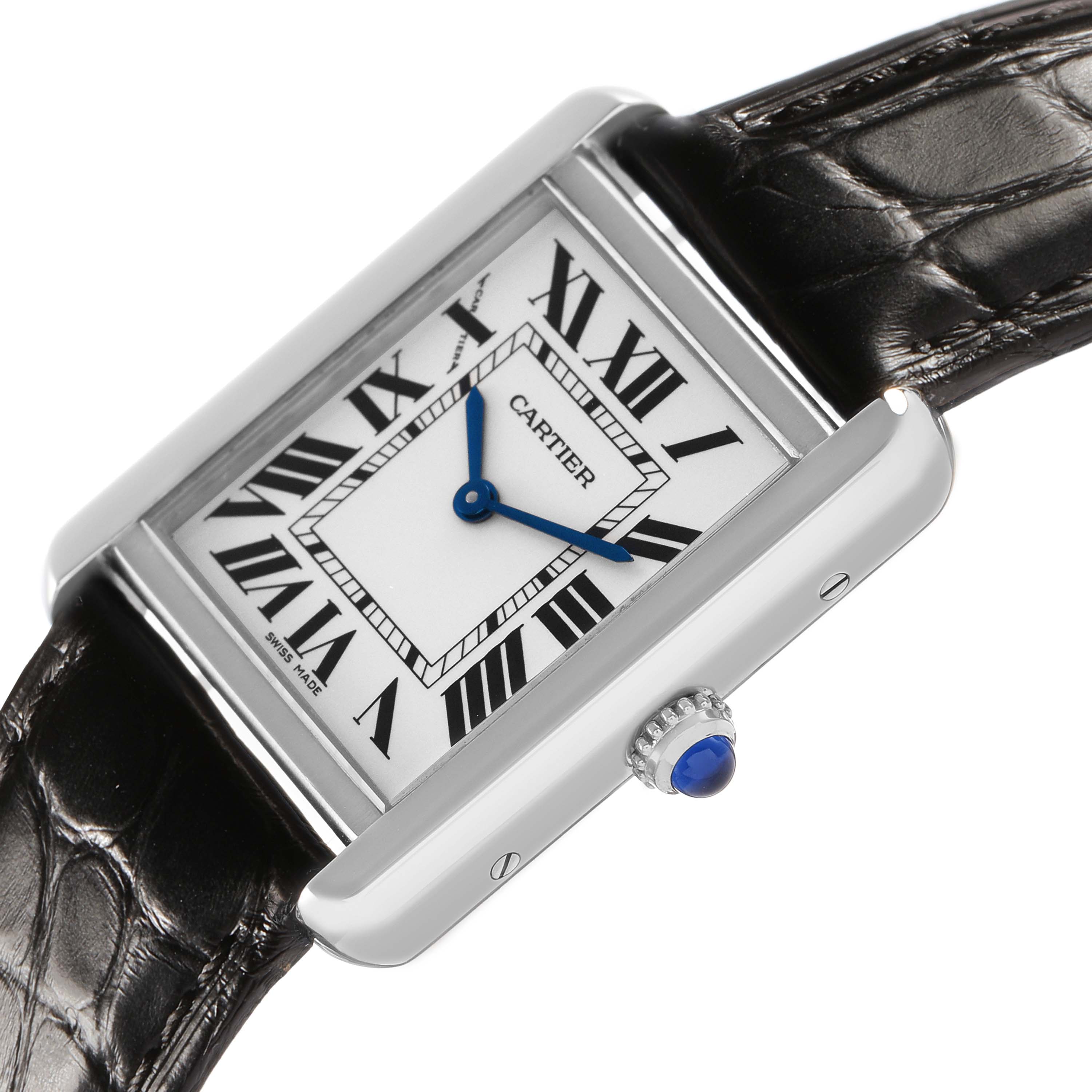 The Cartier Tank Solo WSTA0028 Men's Stainless Steel Silver Dial watch is shown at an angle displaying the face, crown with blue cabochon, and part of the leather strap.