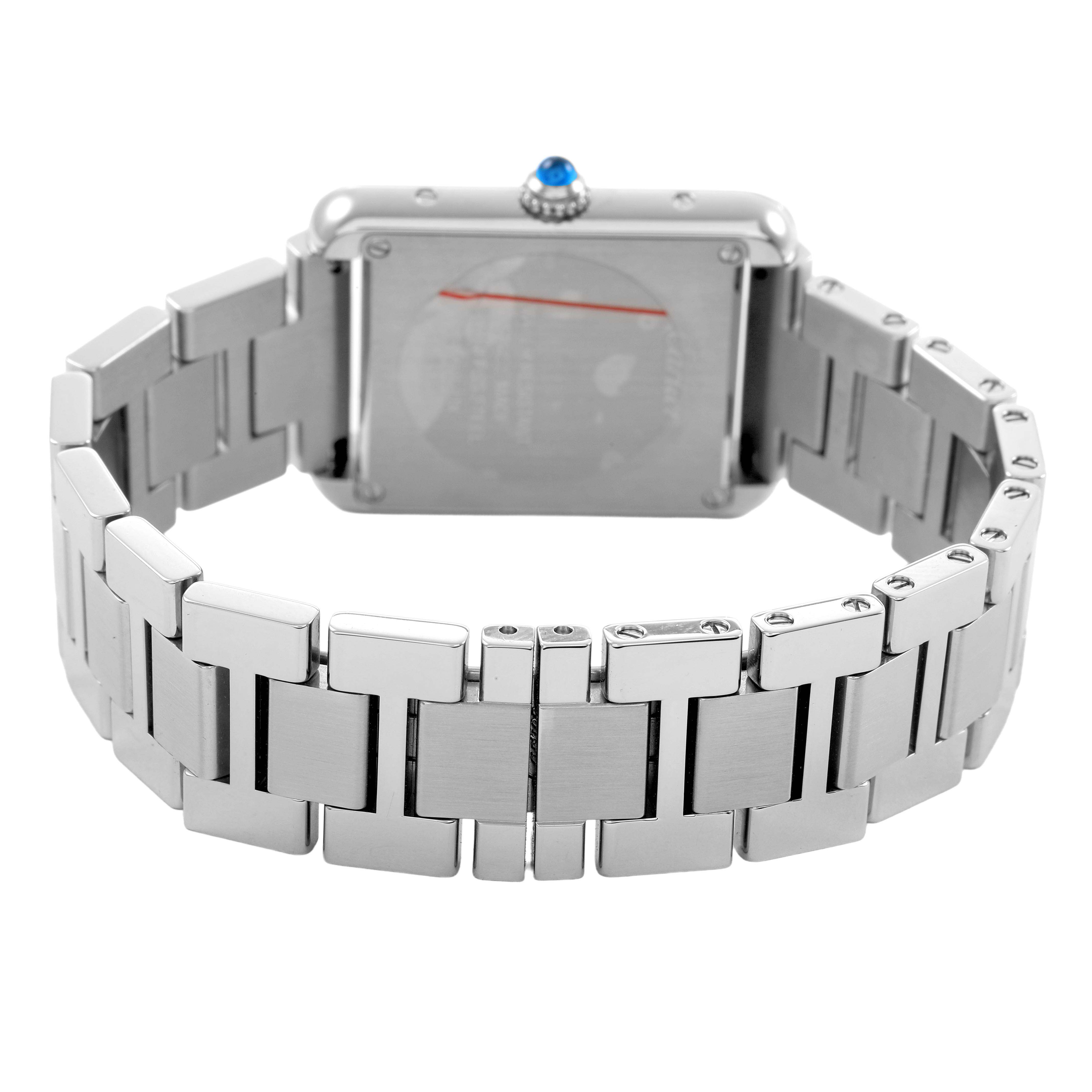 The image shows the back of a Cartier Tank Solo W5200013 Women's Stainless Steel Silver Dial watch, highlighting the bracelet and case back.