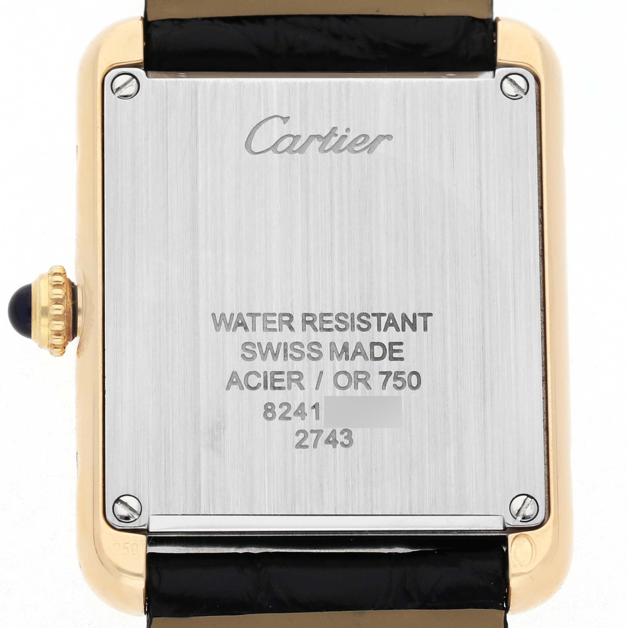The image shows the back of the Cartier Tank Solo W1018755 Women's Yellow Gold Silver Dial watch, highlighting its case details and inscriptions.