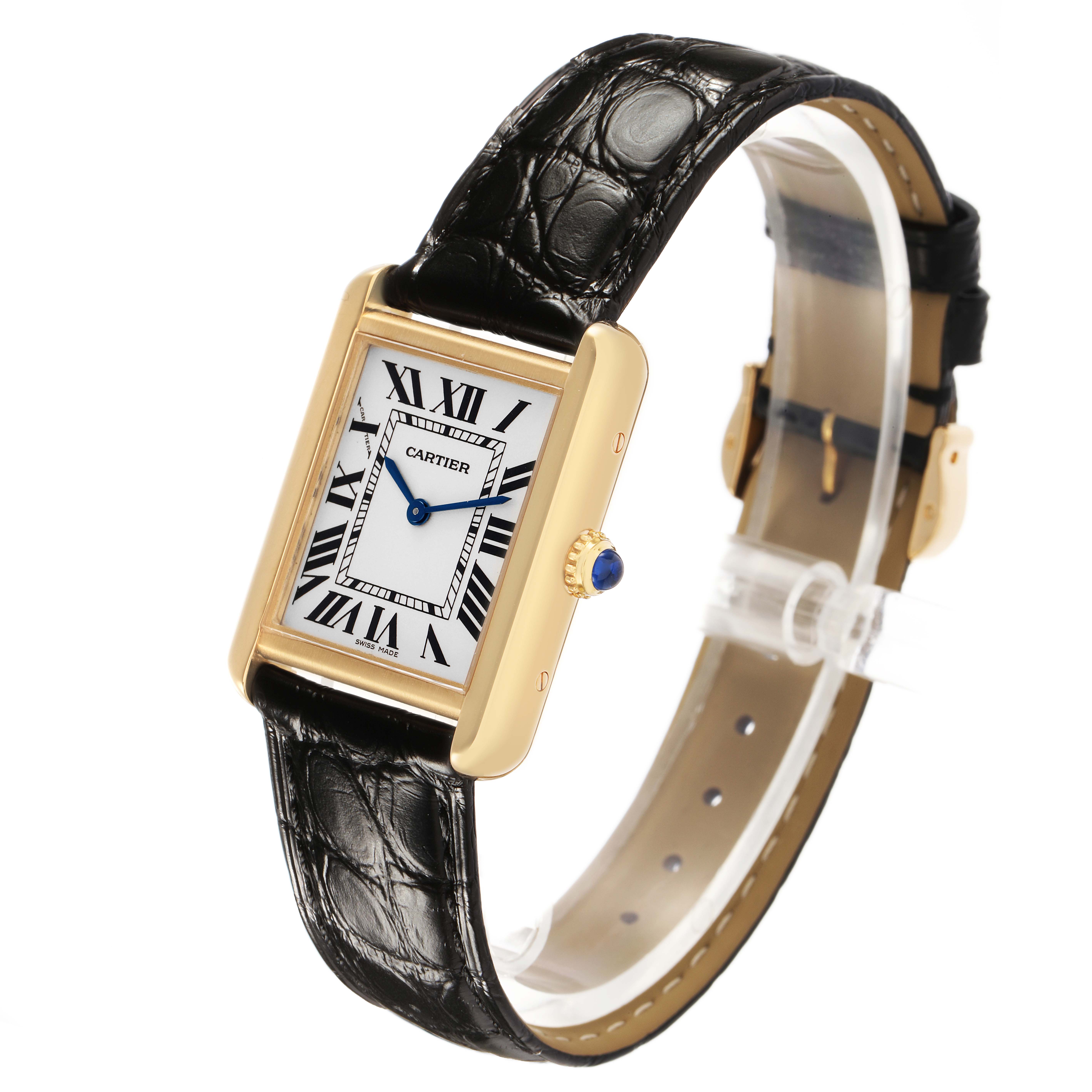 The Cartier Tank Solo W1018755 Women's Yellow Gold Silver Dial watch is shown at an angle displaying its rectangular face, black leather strap, and beaded crown.