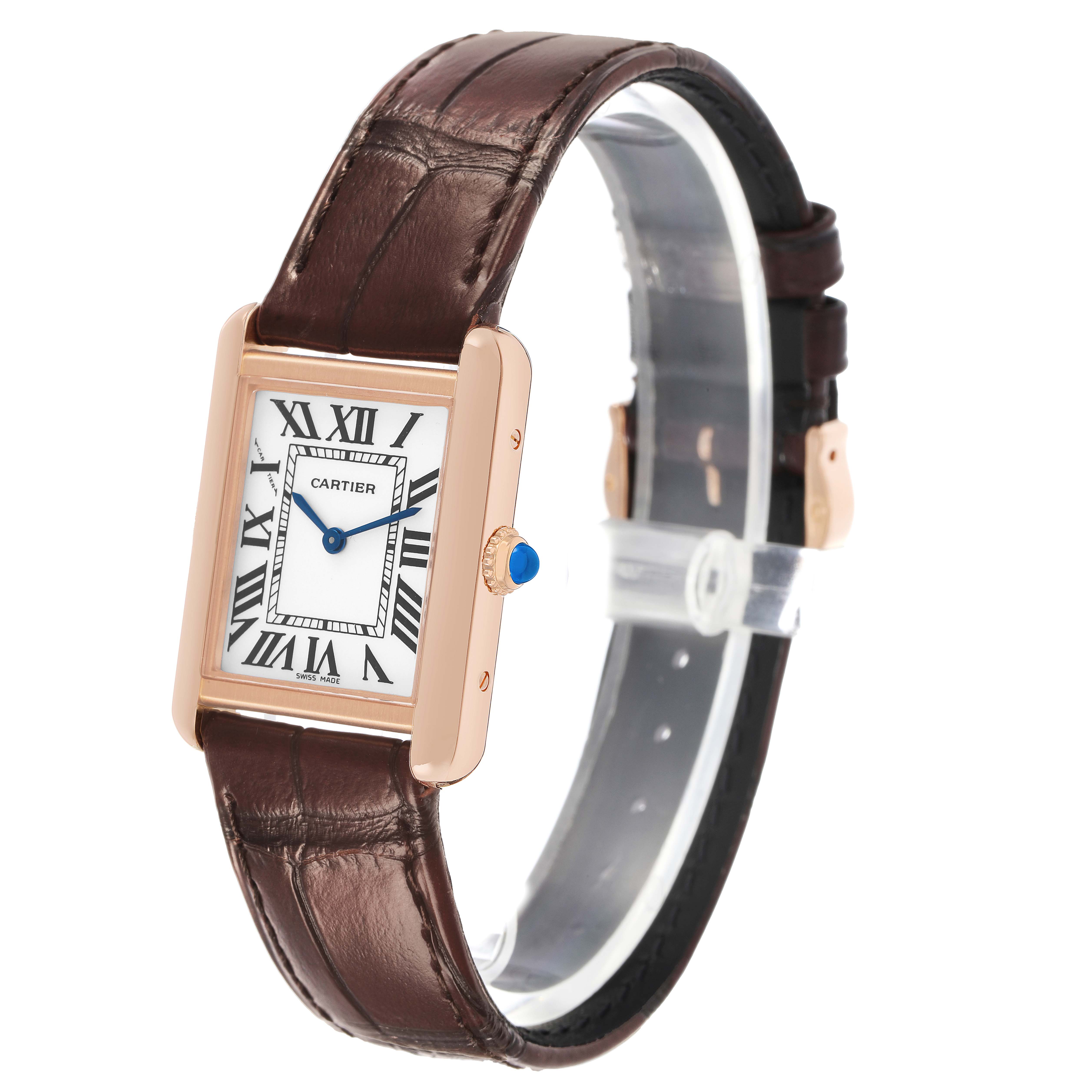 The Cartier Tank Solo W5200002 Women's Steel and Gold (two tone) Silver Dial watch is shown at a three-quarter side angle, highlighting its rectangular face, brown leather strap, and crown.