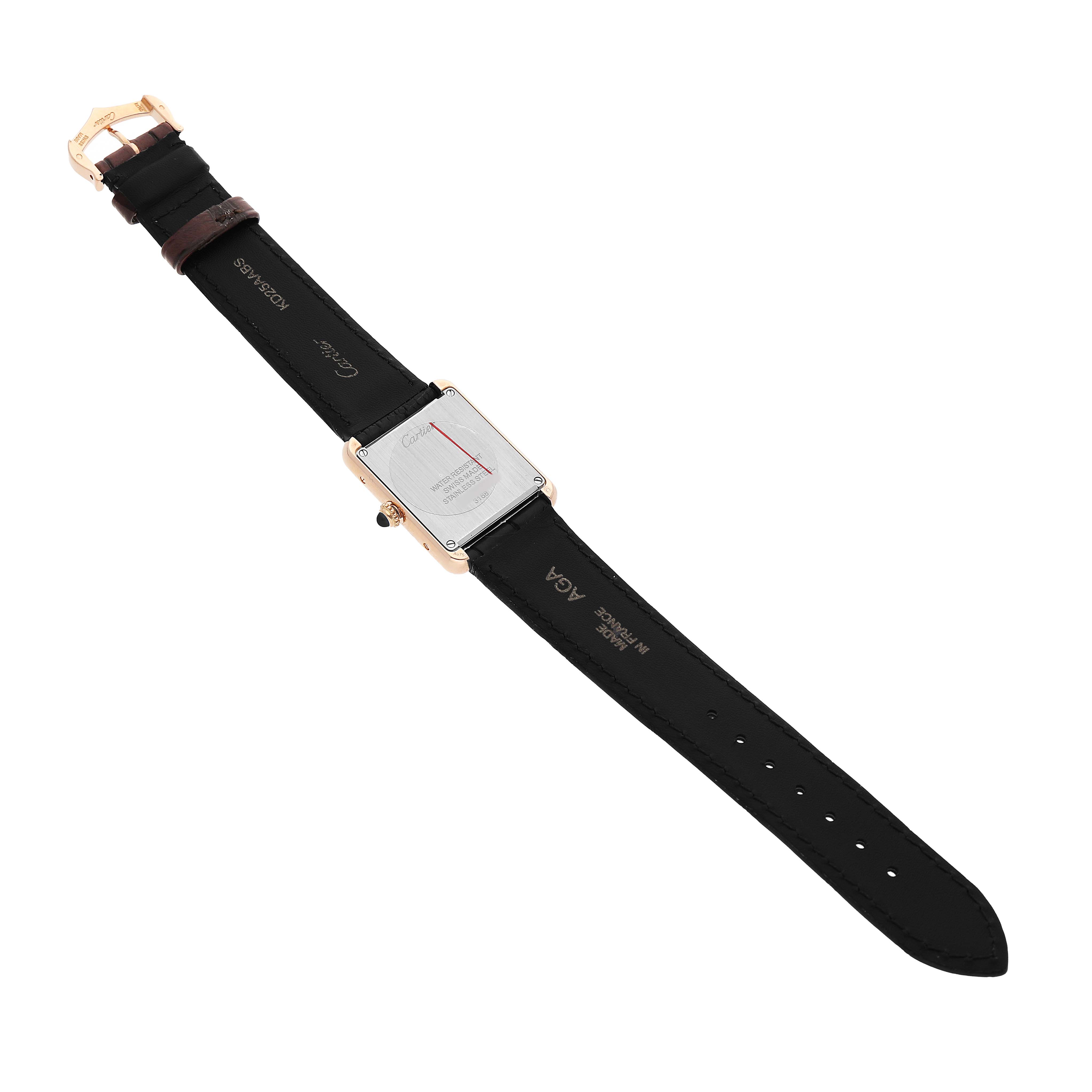 The Cartier Tank Solo W5200002 Women's Steel and Gold (two tone) Silver Dial watch is shown from the back, displaying the case back and black leather strap.