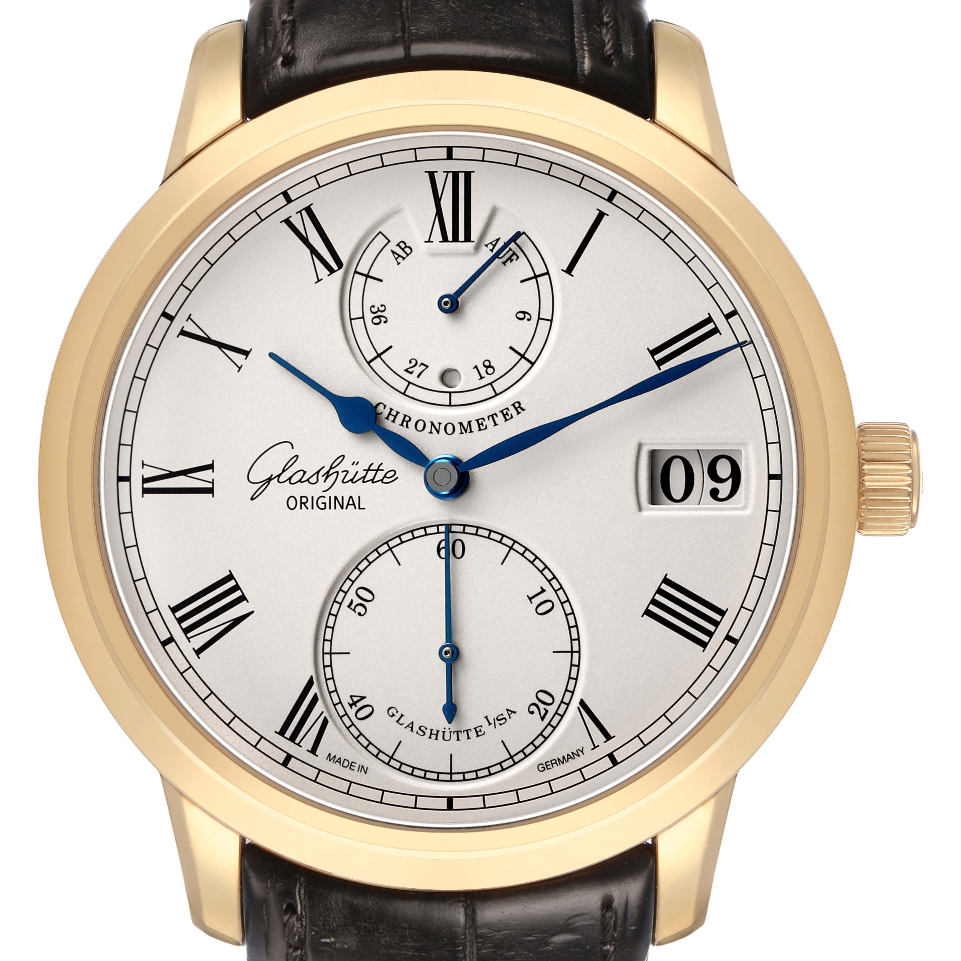 The Glashütte Senator watch is shown from a top-down angle, highlighting the dial, Roman numerals, sub-dials, and date window.