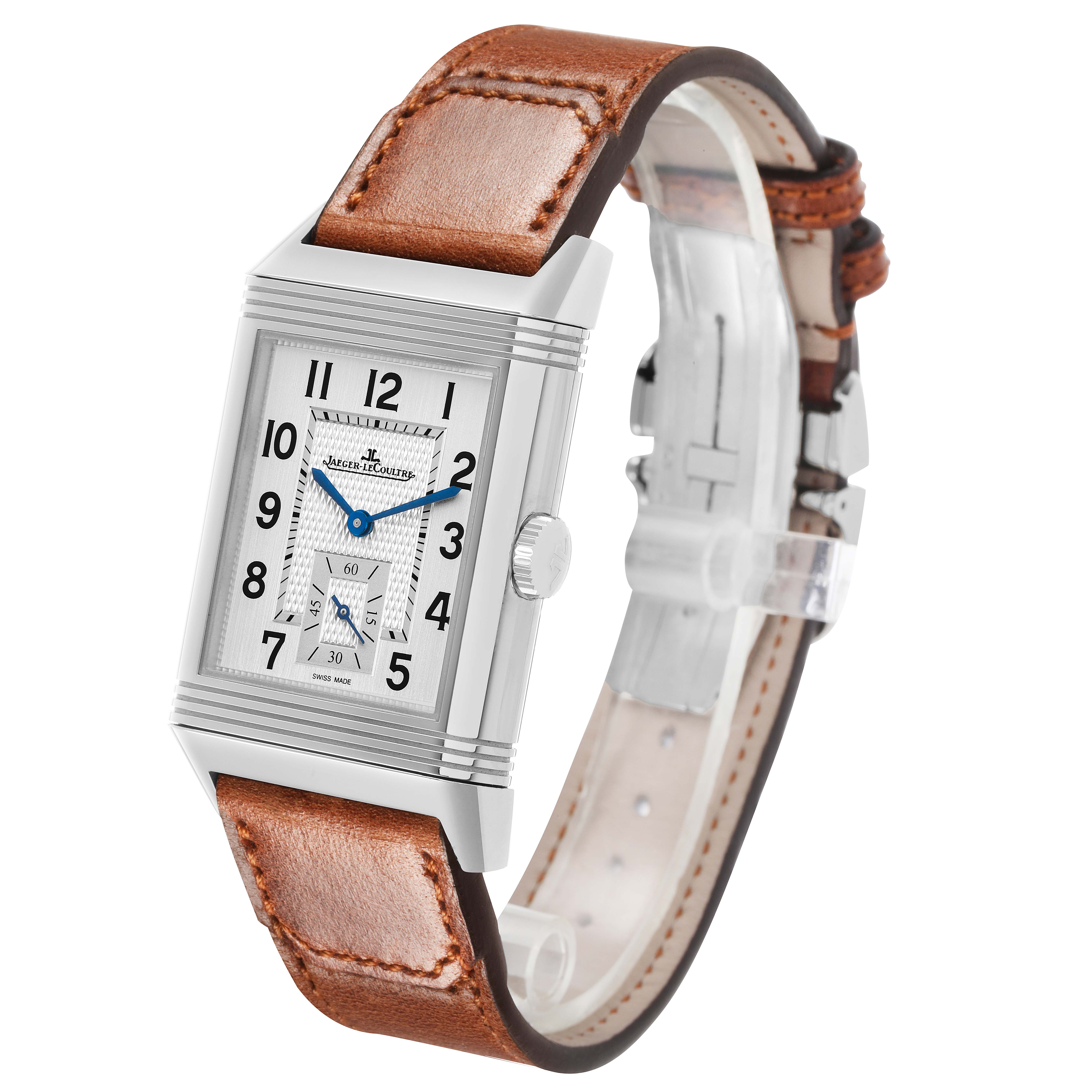 The Jaeger LeCoultre Reverso Q3848422 Men's Stainless Steel Silver Dial watch is shown at an angled view, displaying the face, case, and brown leather strap.