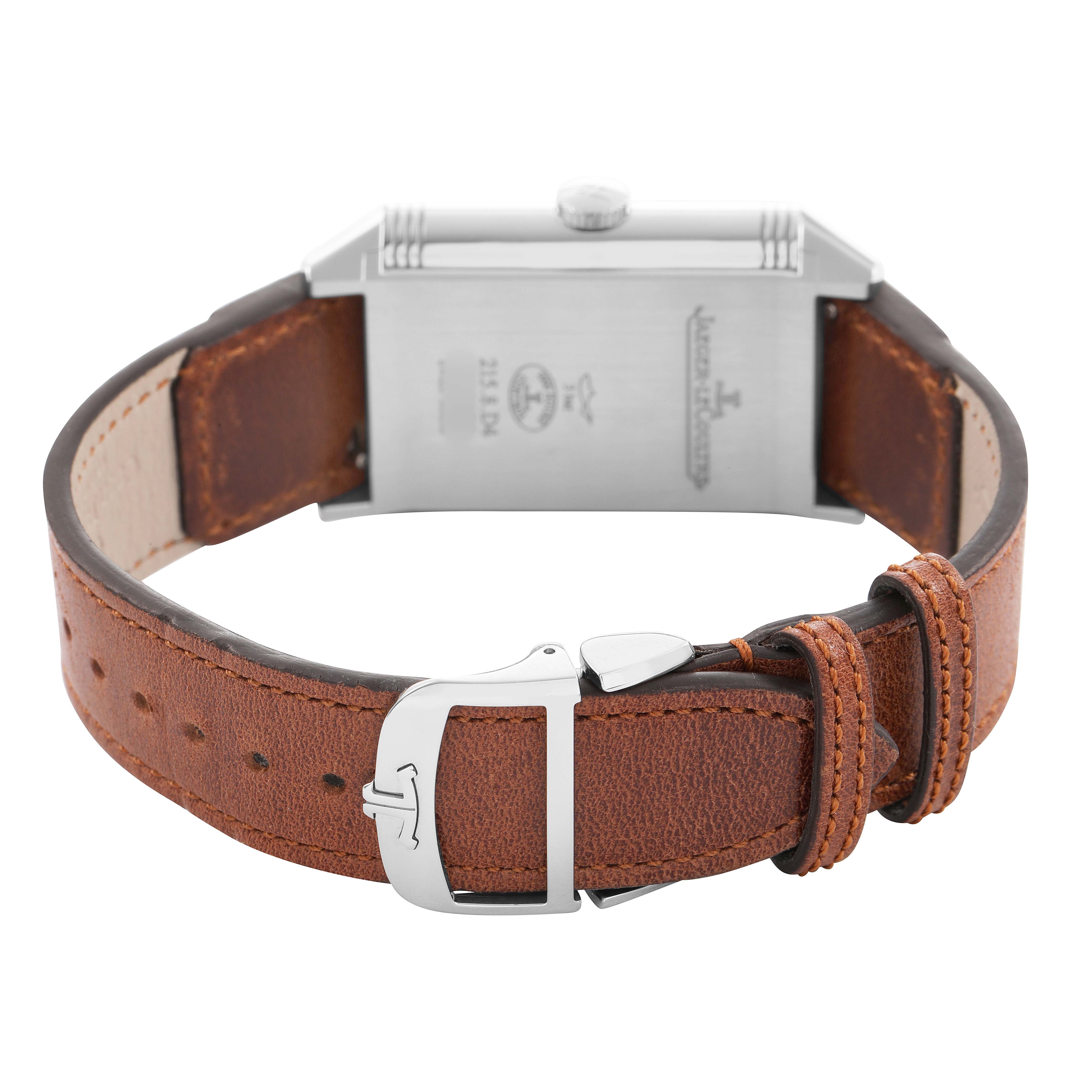 The Jaeger-LeCoultre Reverso model is shown from the back, highlighting the case, crown, and brown leather strap with buckle.