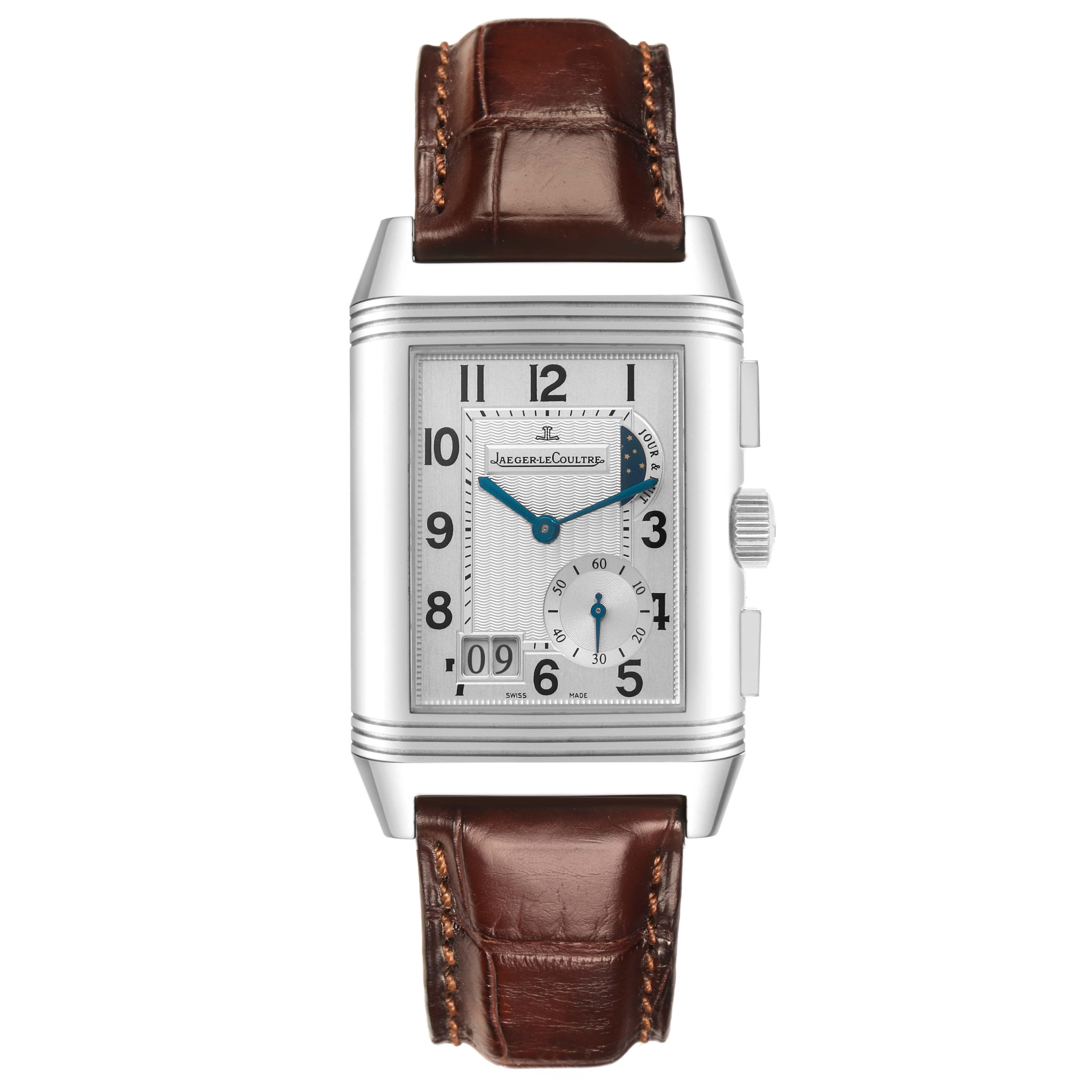 The Jaeger-LeCoultre Reverso watch is shown from the front, highlighting its face, case, and brown leather strap.