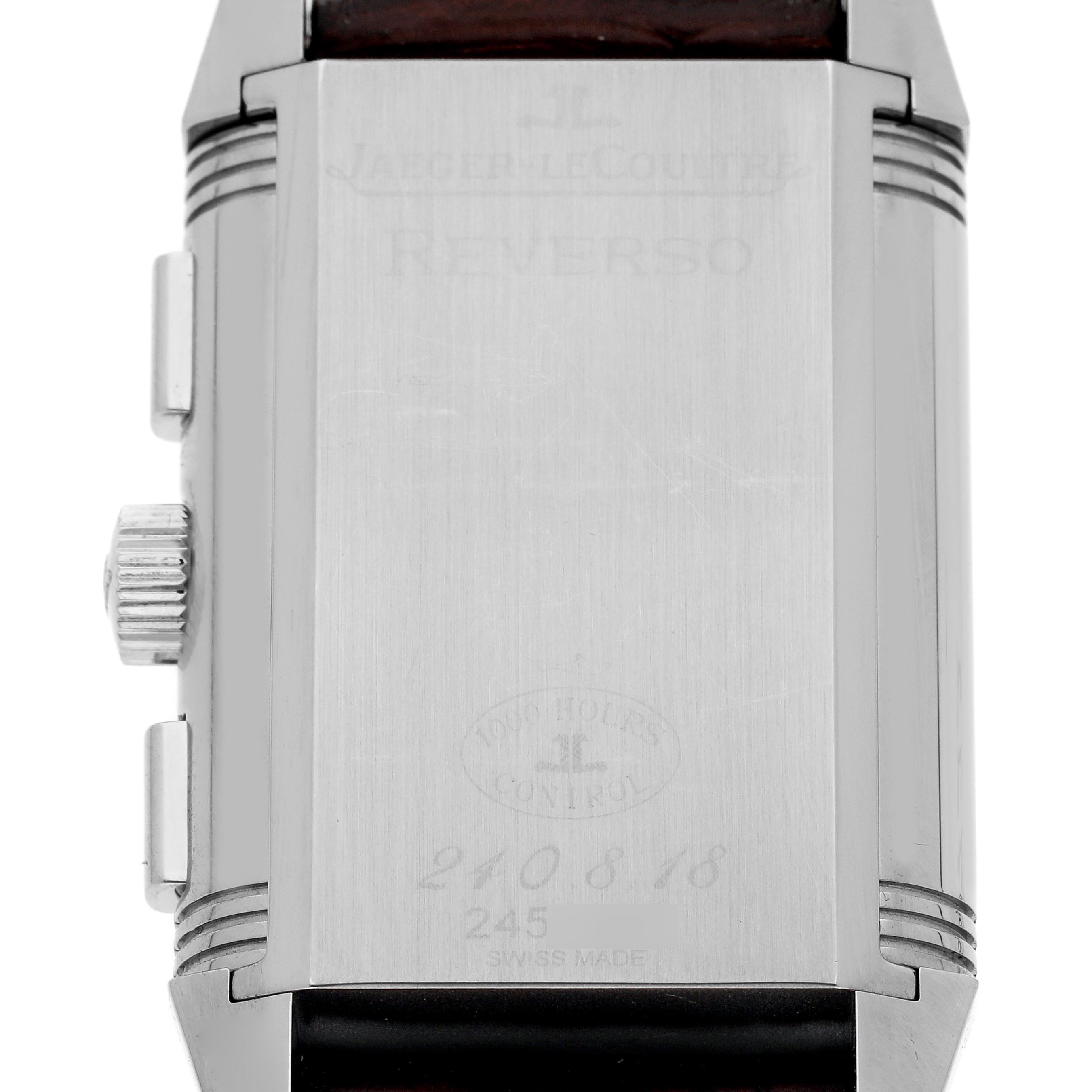The image shows the back of a Jaeger LeCoultre Reverso Q3028420 Men's Stainless Steel Silver Dial Q3028420 Men's Stainless Steel Silver Dial watch, highlighting its rectangular shape and crown.