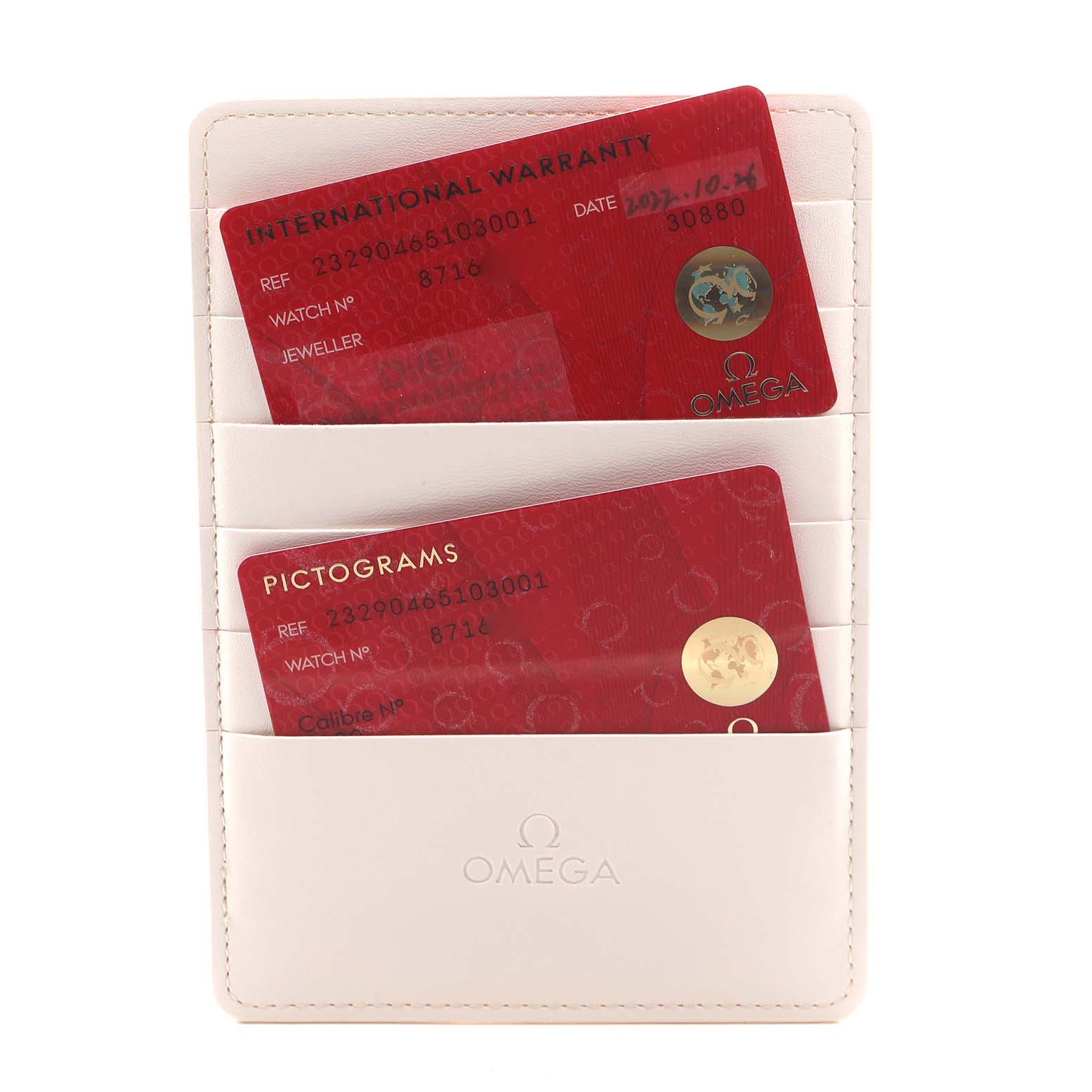 The image shows Omega Planet Ocean 232.90.46.51.03.001 Men's Stainless Steel Blue Dial 232.90.46.51.03.001 Men's Stainless Steel Blue Dial watch accessories, specifically two red cards in a holder for warranty and information.