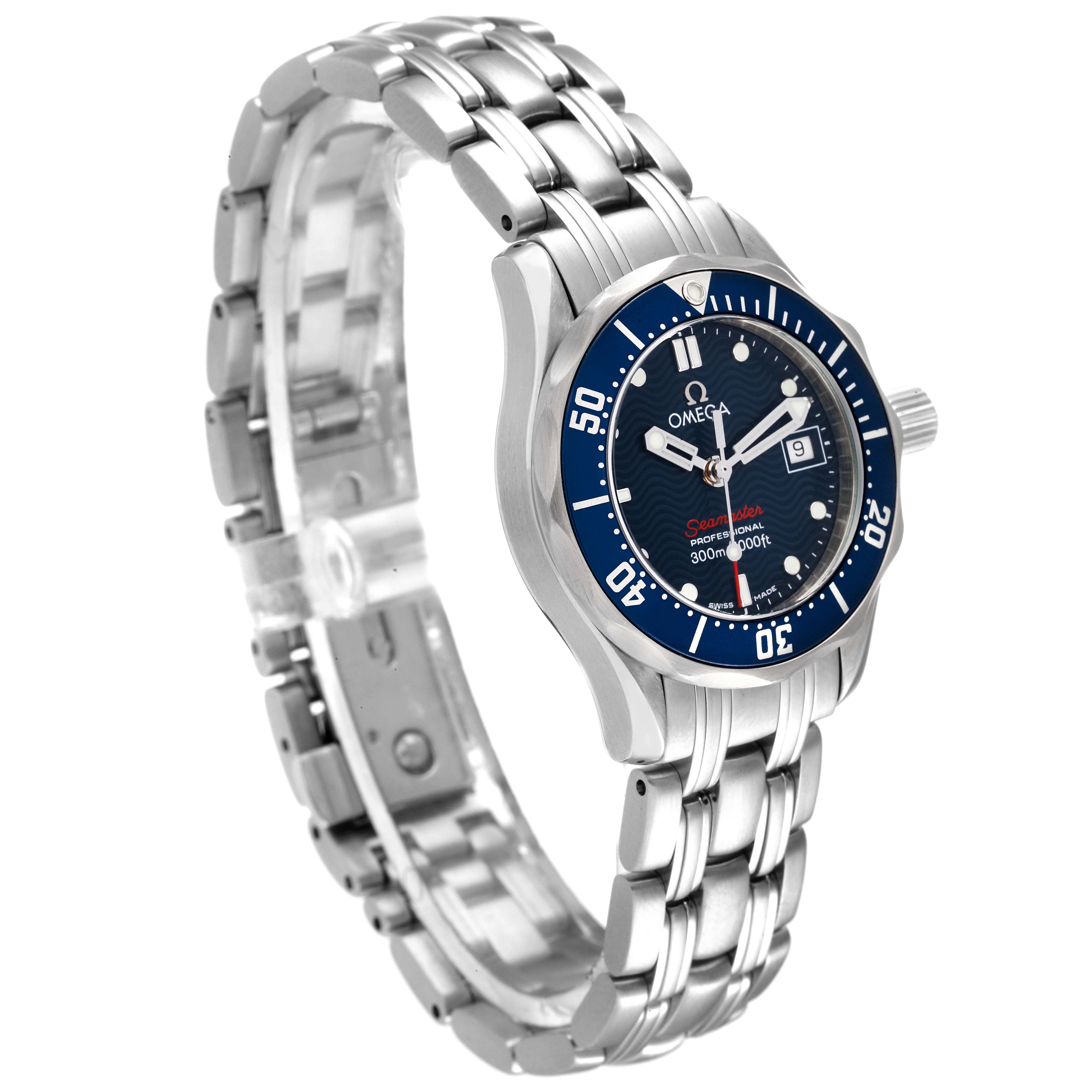 The image shows an angled view of an Omega 2224.80.00 Women's Stainless Steel Blue Dial 2224.80.00 Women's Stainless Steel Blue Dial Seamaster Diver 300M 28mm Steel Ladies Watch 2224.80.00, highlighting its blue dial and steel bracelet.