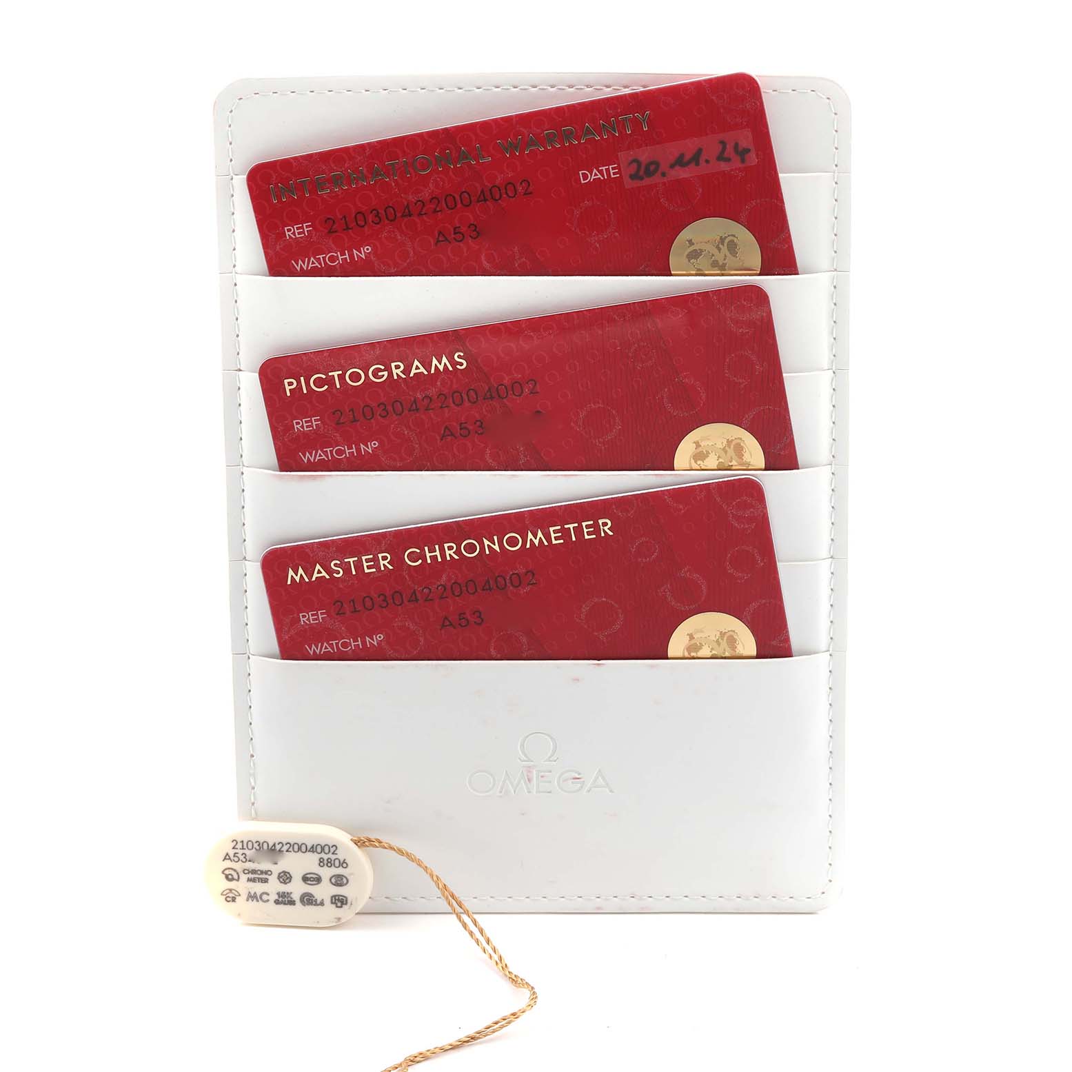 The image shows an Omega Seamaster 210.30.42.20.04.002 Men's Stainless Steel White Dial 210.30.42.20.04.002 Men's Stainless Steel White Dial's warranty and certification cards, along with a tag, in a white cardholder.