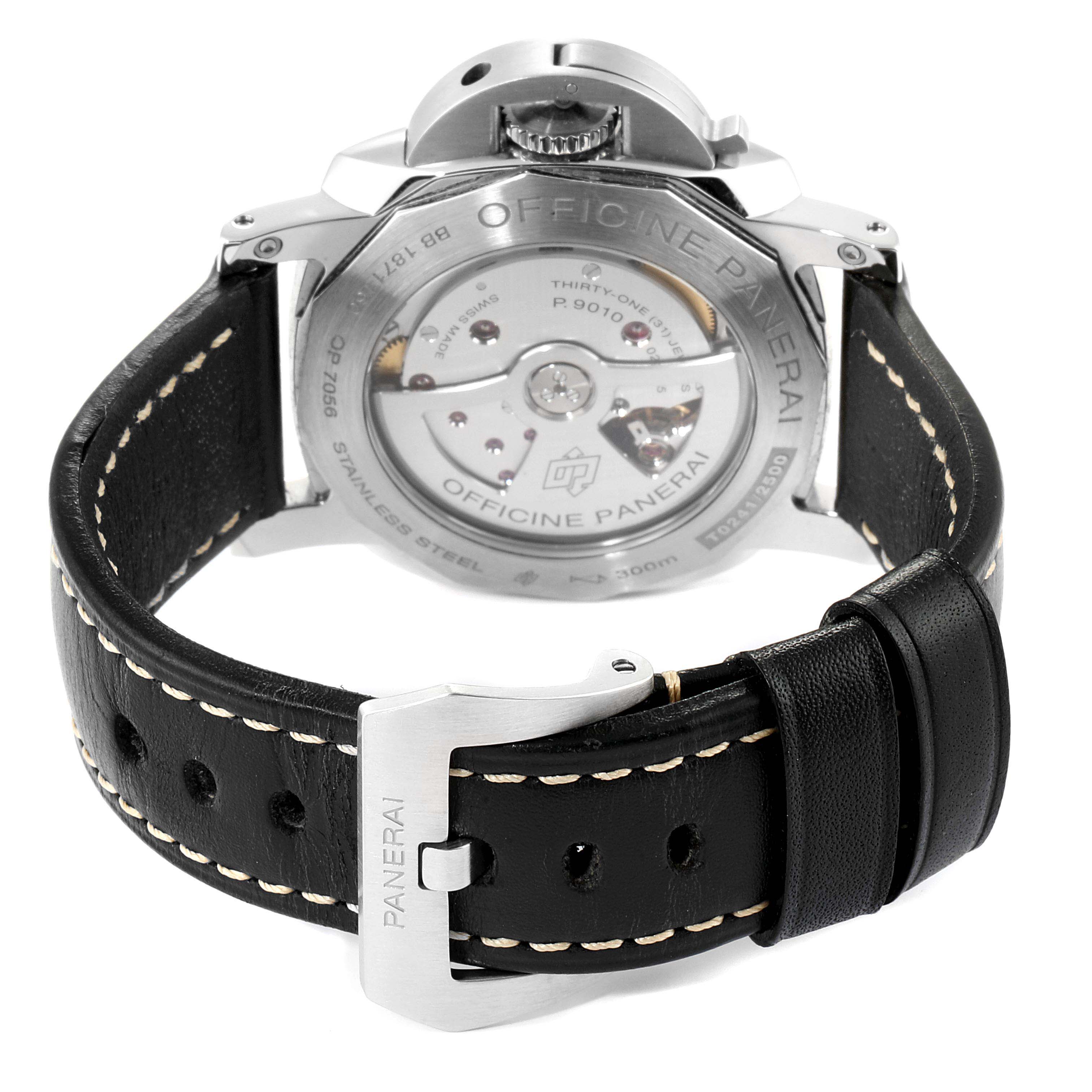 The image shows the back view of a Panerai Luminor PAM01359 Men
s Stainless Steel Black Dial PAM01359 Men
s Stainless Steel Black Dial watch featuring its movement and black leather strap with a Panerai-engraved buckle.