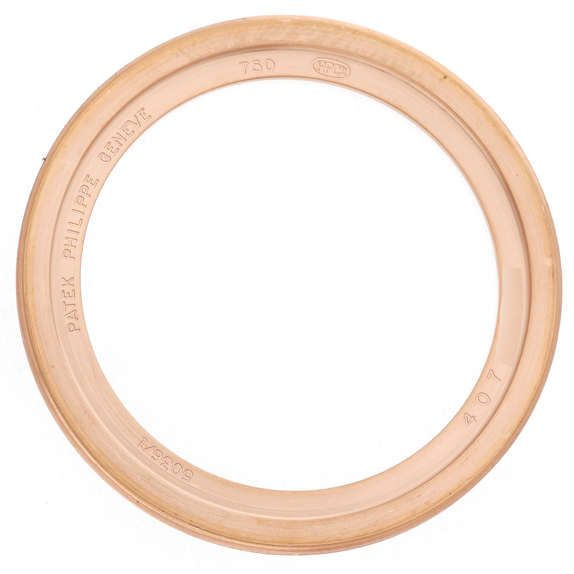 The image shows a gold watch bezel from a Patek Philippe Complications 5036 Men's Rose Gold White Dial model, viewed from above.