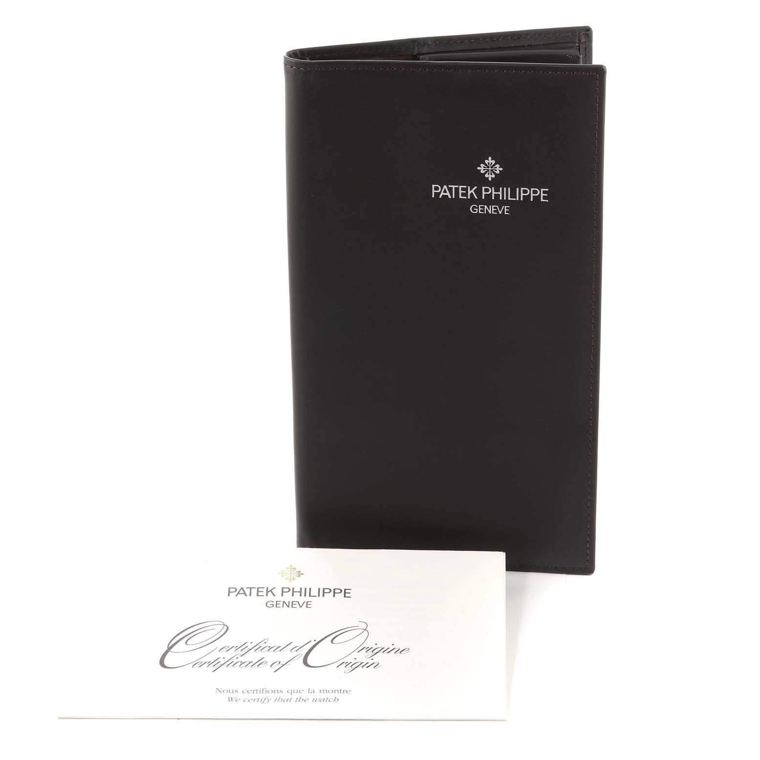 The image shows a Patek Philippe Calatrava 5227G Men's White Gold Black Dial 5227G Men's White Gold Black Dial model certificate of origin and a black leather holder.