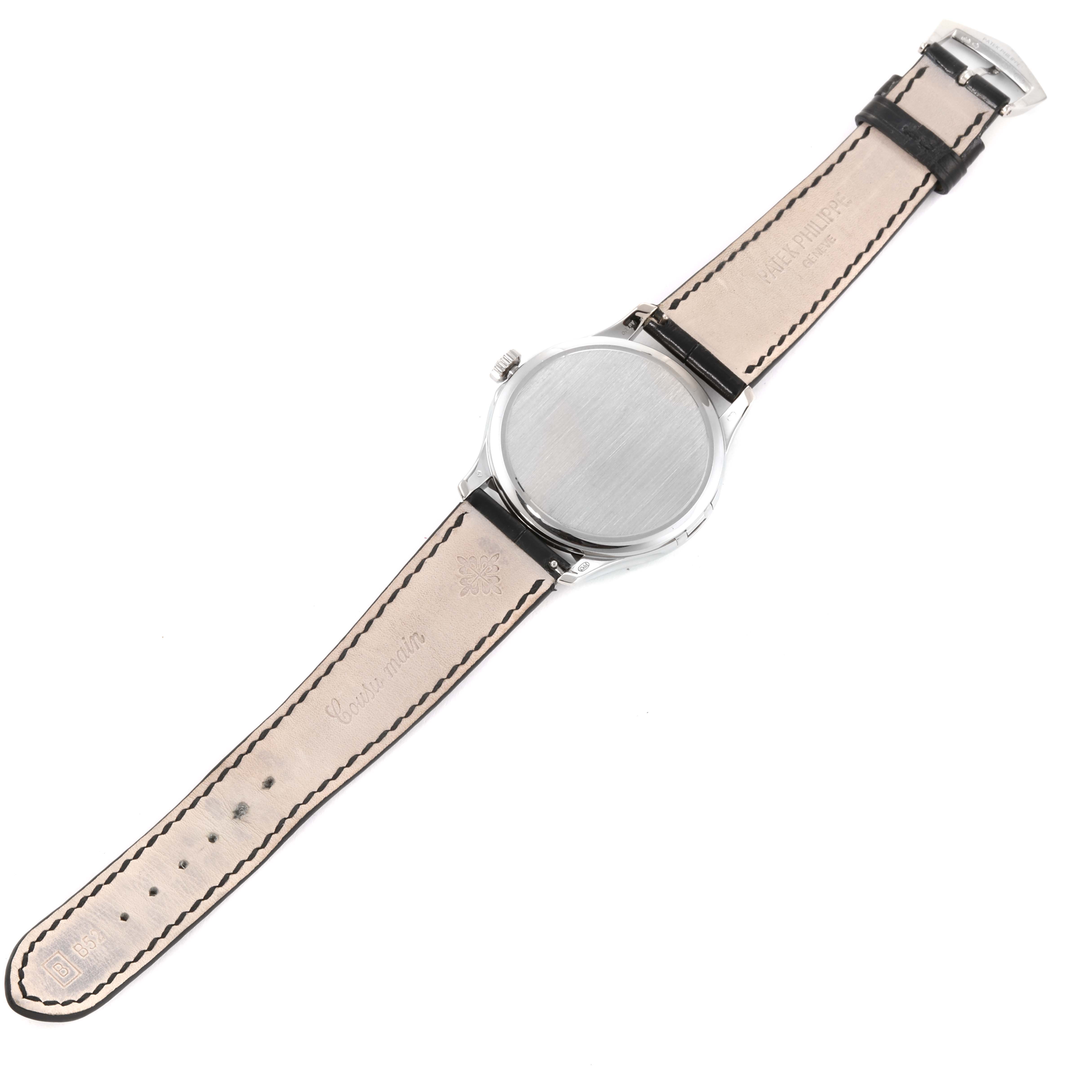 This image shows the back view of a Patek Philippe Calatrava 5227G Men's White Gold Black Dial 5227G Men's White Gold Black Dial watch, featuring the watch case and leather strap.