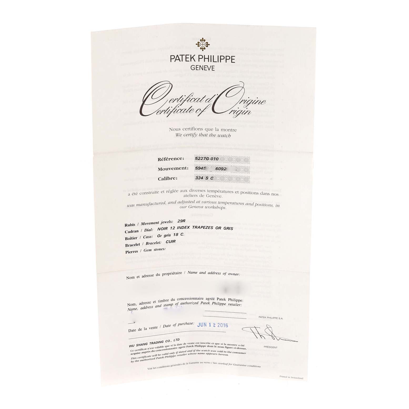 This is a Certificate of Origin for the Patek Philippe Calatrava 5227G Men's White Gold Black Dial 5227G Men's White Gold Black Dial model, showing reference, movement, and caliber details.