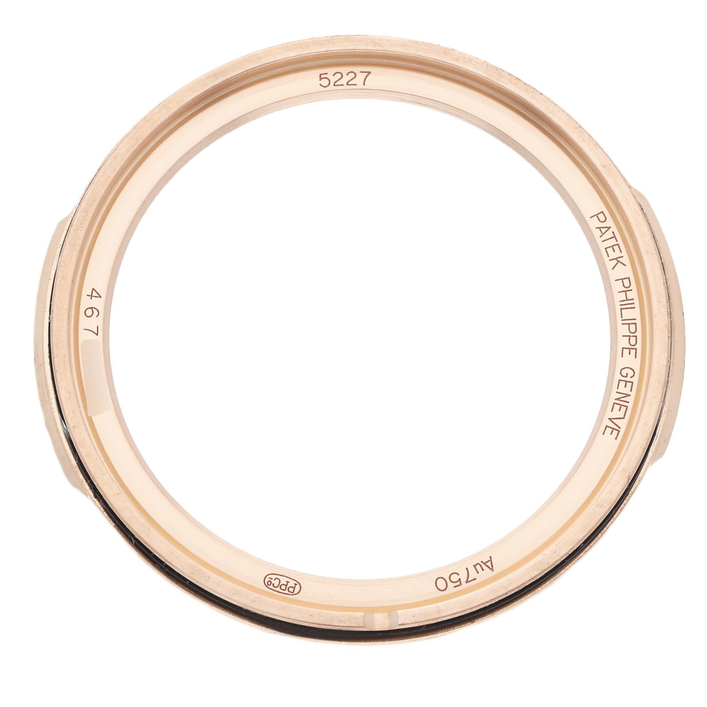 This image shows a top view of the bezel and inner ring of a Patek Philippe Calatrava 5227R Men's Rose Gold Beige Dial model.