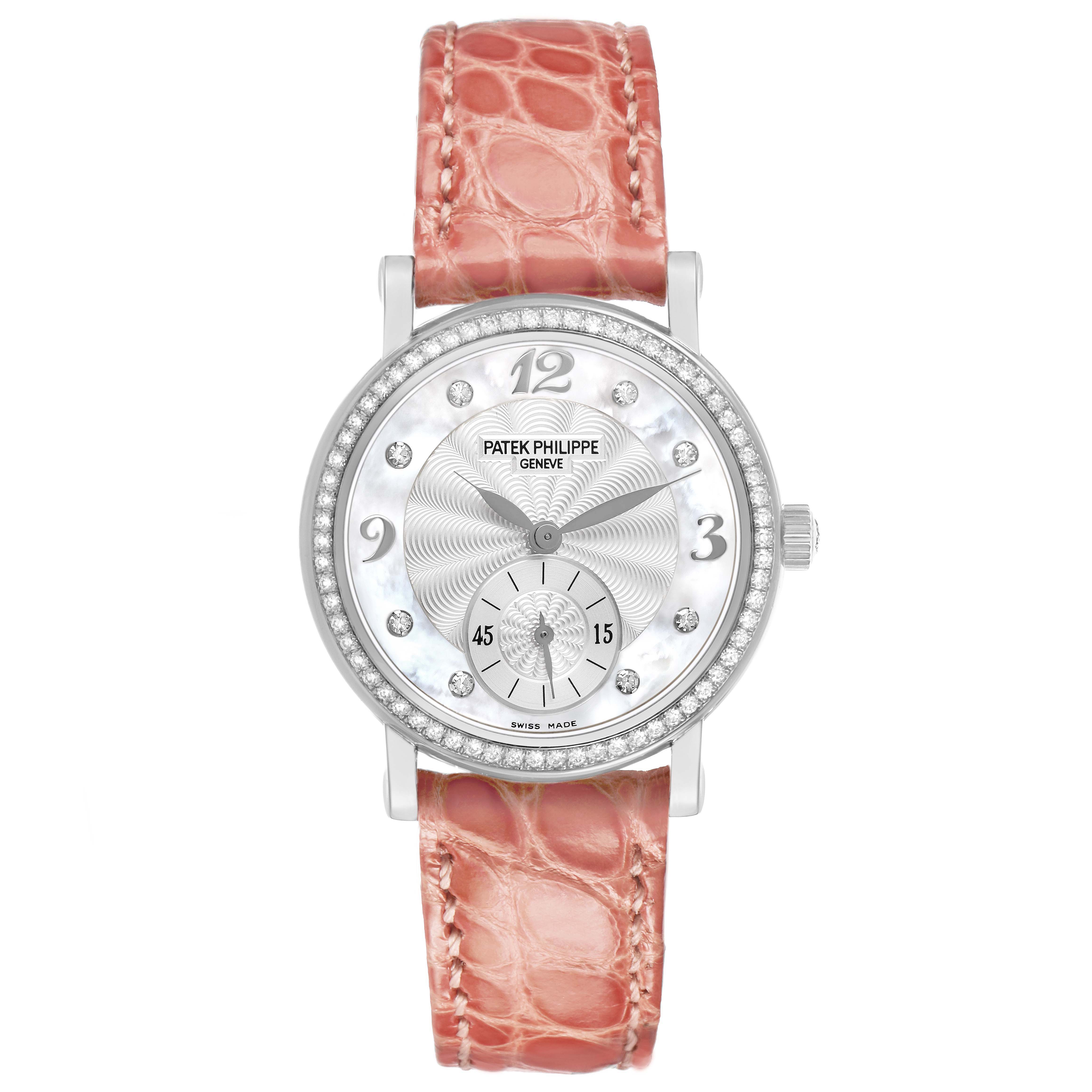The Patek Philippe Calatrava 4959G Women's White Gold Silver Dial watch is shown from a top view, highlighting its dial, diamond accents, and leather strap.