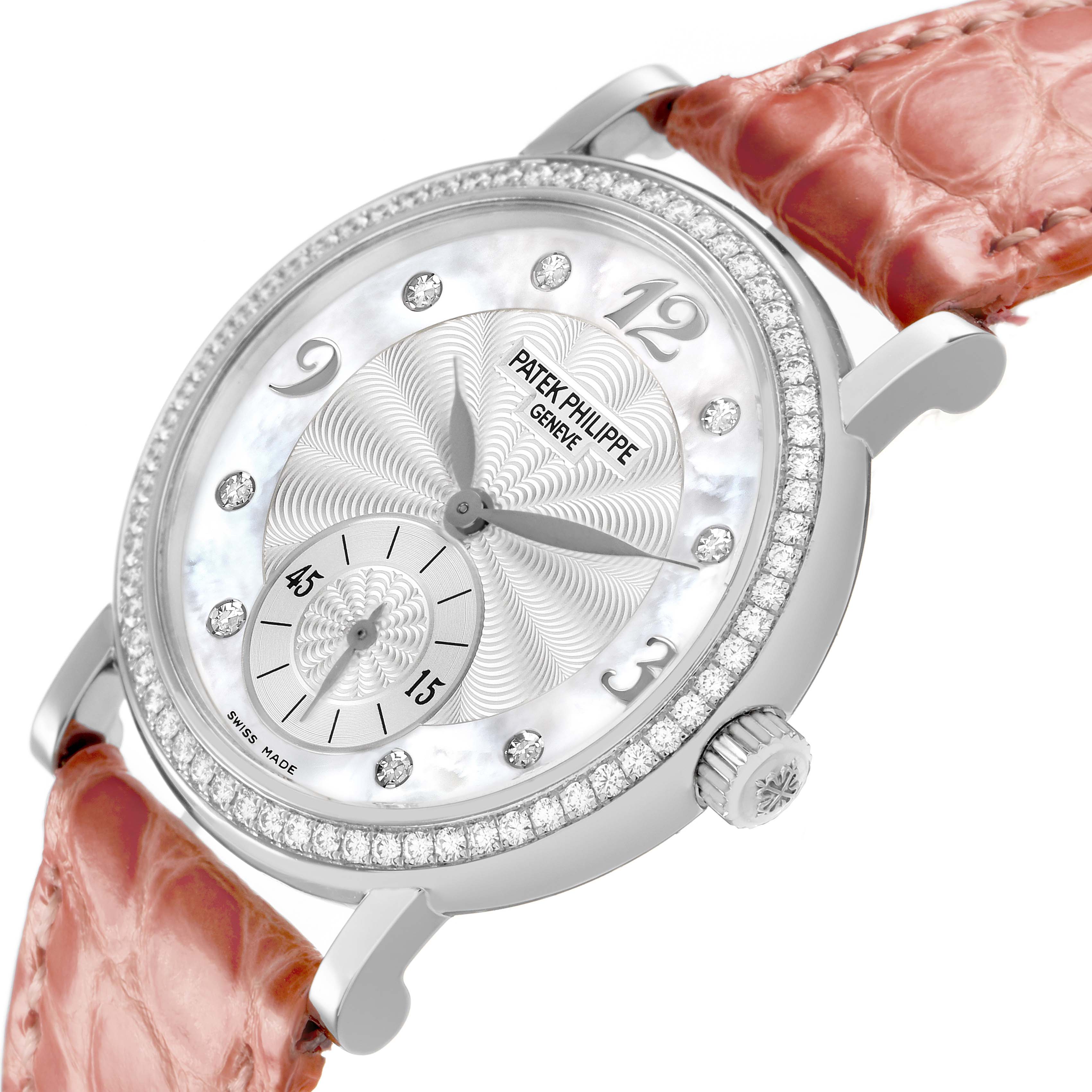 The Patek Philippe Calatrava 4959G Women's White Gold Silver Dial watch is shown at an angled close-up, highlighting the dial, diamond bezel, and strap attachment.