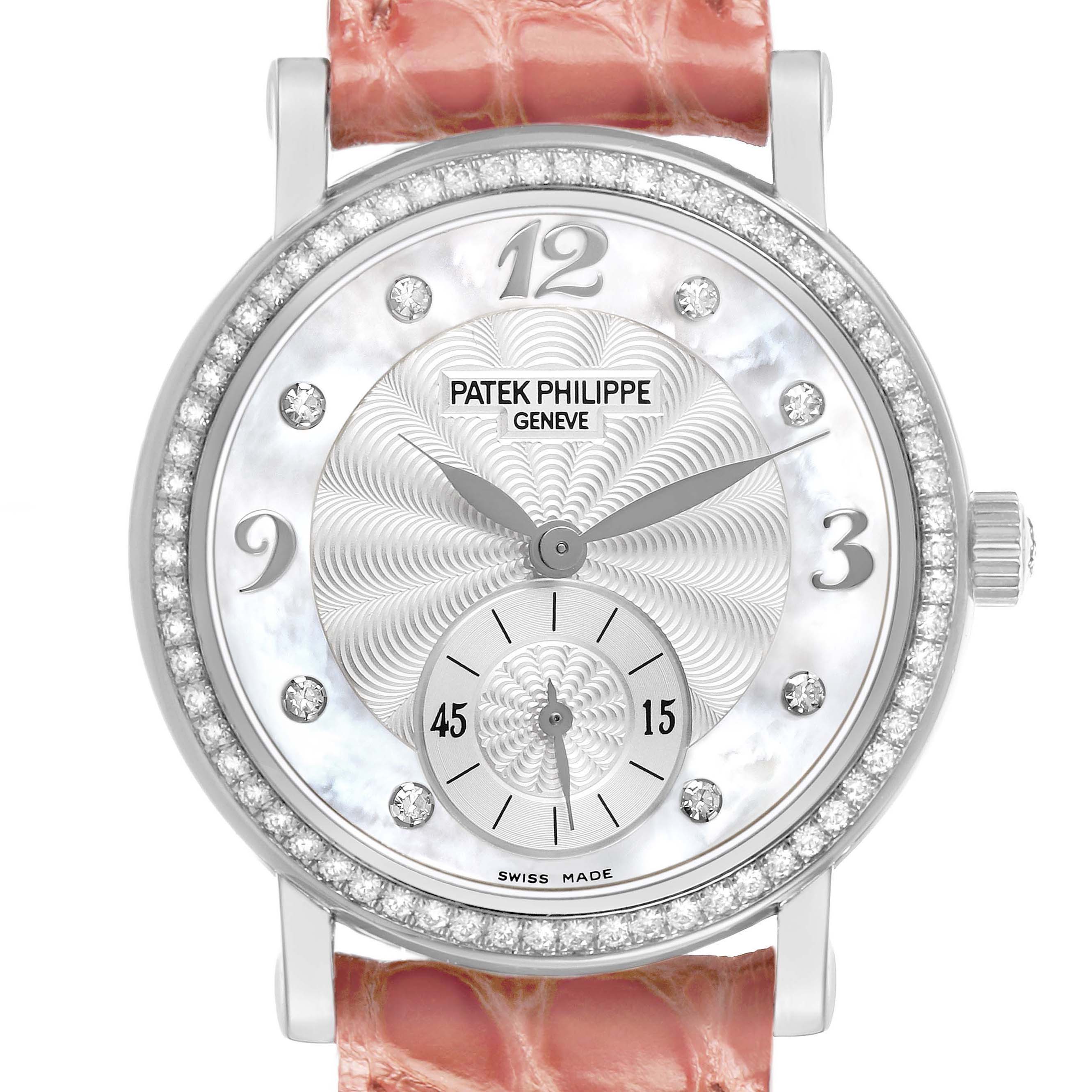 The Patek Philippe Calatrava 4959G Women's White Gold Silver Dial watch is shown from the front, highlighting the dial with diamond accents and pink strap.