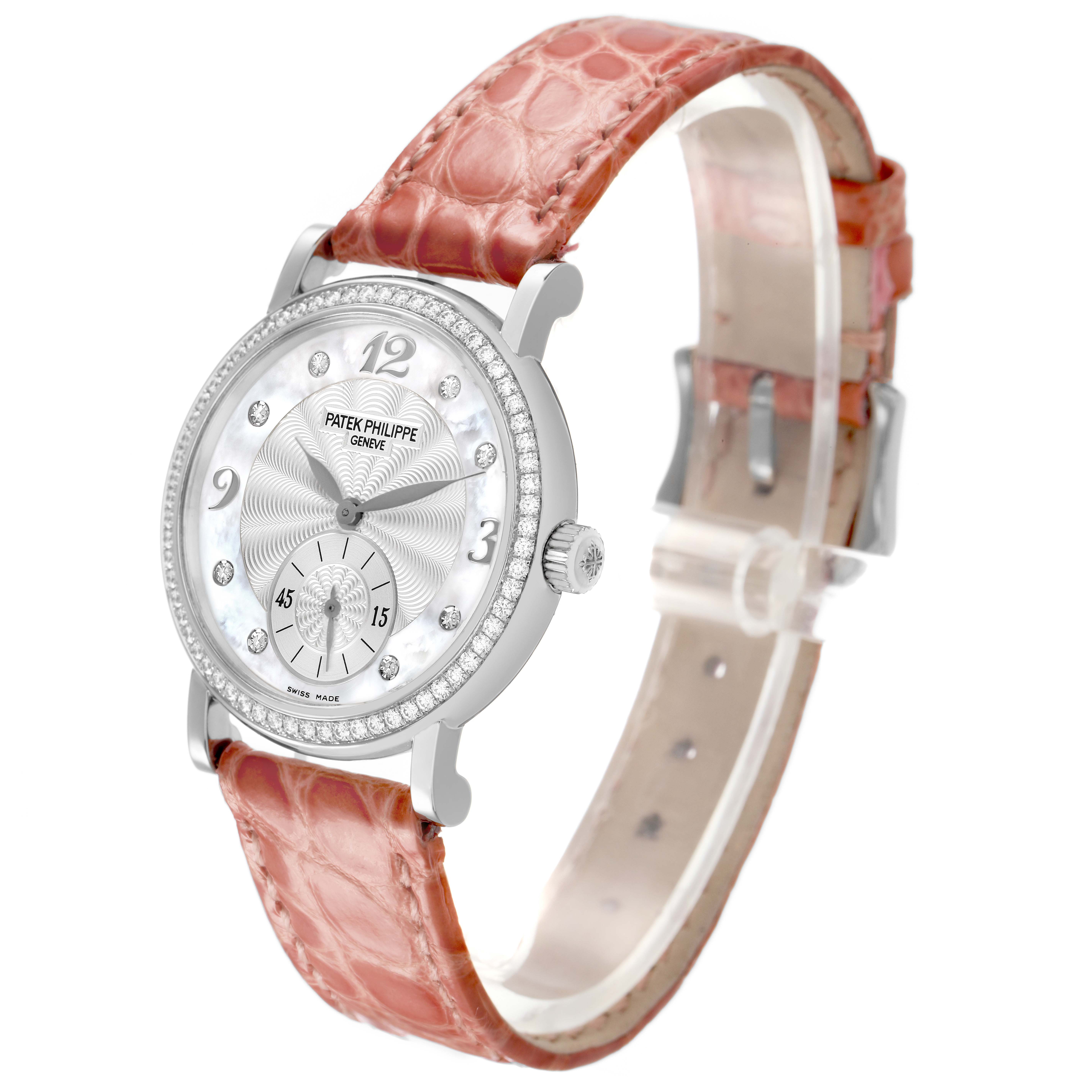 The Patek Philippe Calatrava 4959G Women's White Gold Silver Dial watch is shown at a three-quarter angle, highlighting its face, bezel, and leather strap.