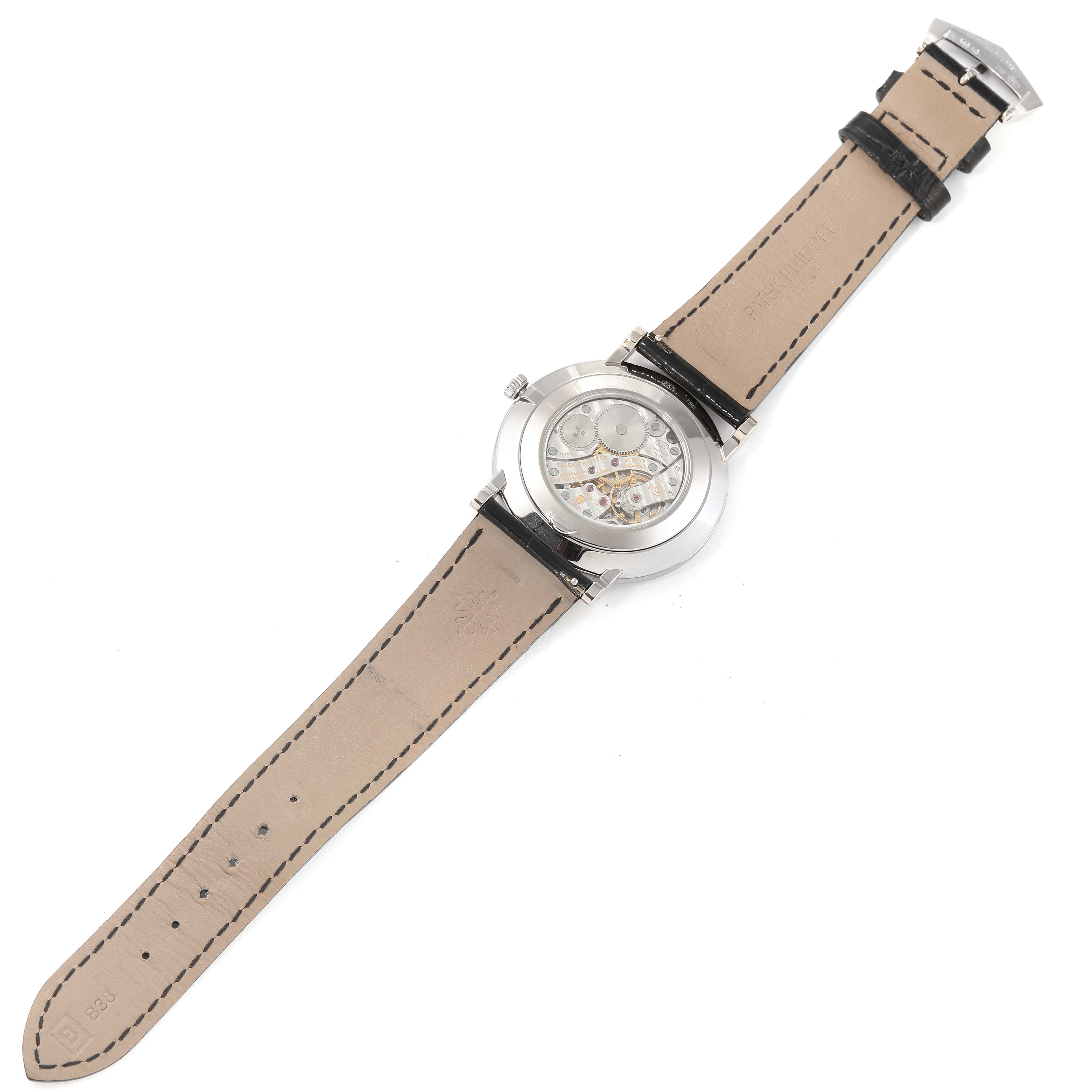 This image shows the back view of the Patek Philippe Calatrava 5116G Men
s White Gold White Dial 5116G Men
s White Gold White Dial watch, highlighting the movement and leather strap.
