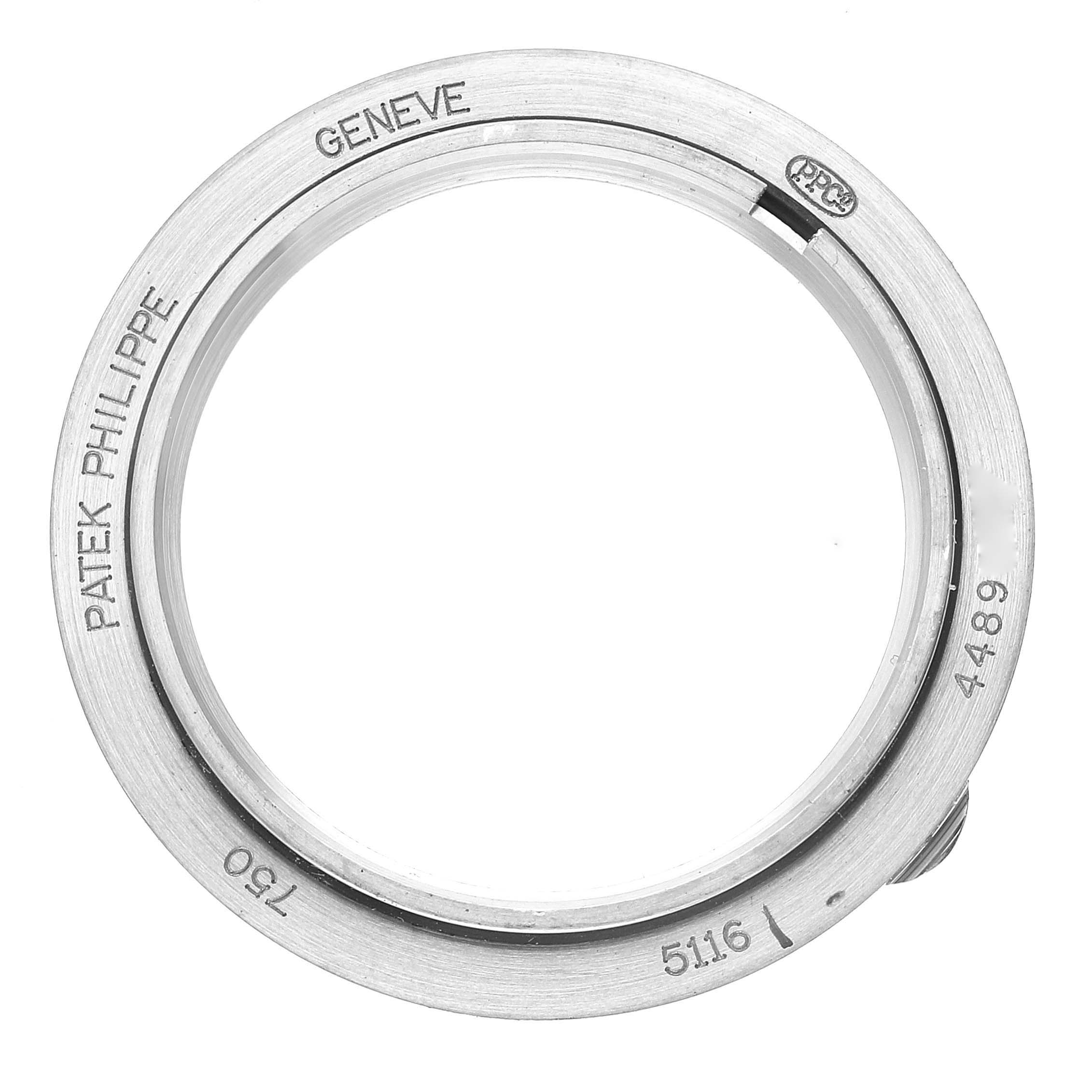 The image shows the bezel and casing ring of a Patek Philippe Calatrava 5116G Men
s White Gold White Dial 5116G Men
s White Gold White Dial model watch, viewed from a top-down angle.