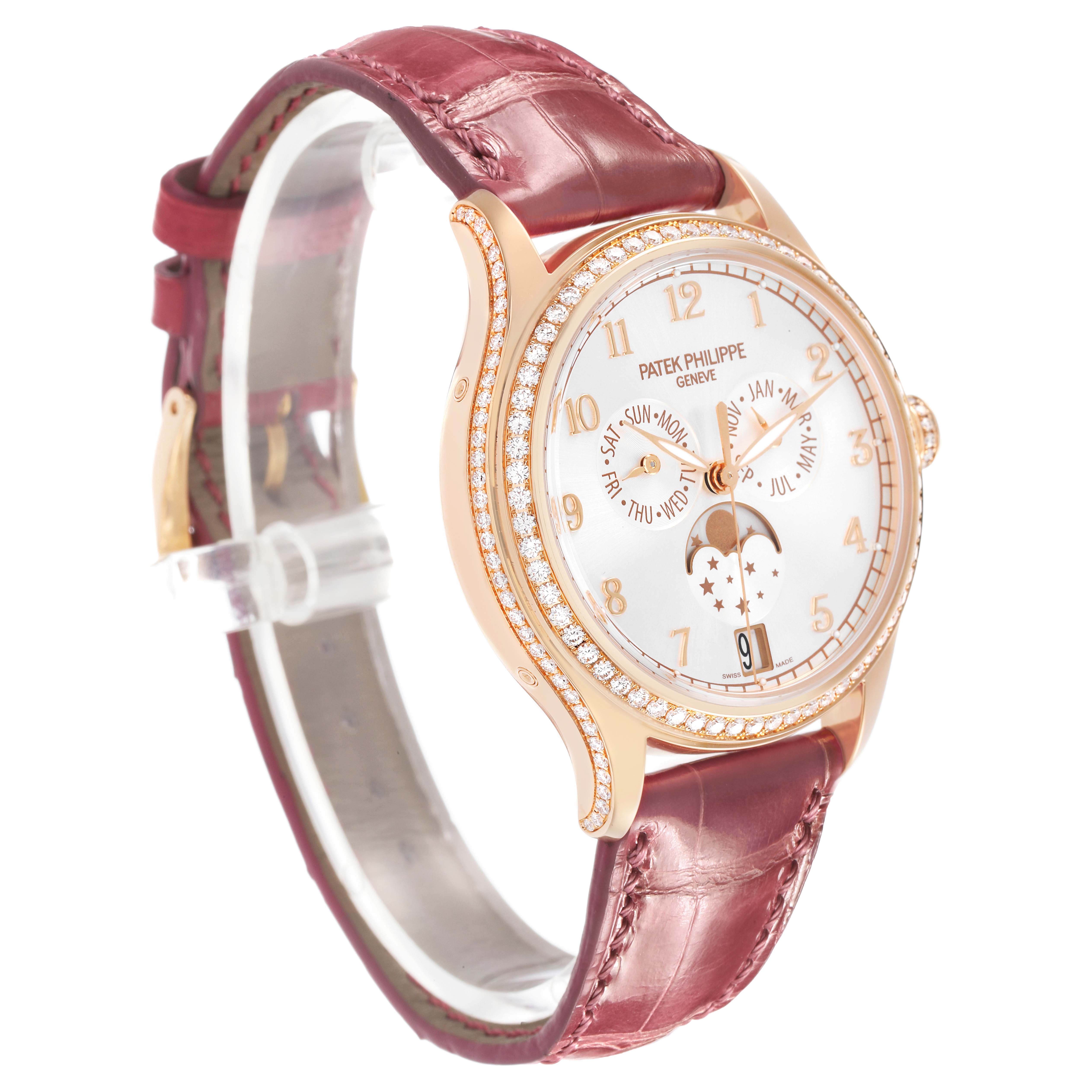 The Patek Philippe Complications 4947R-001 Men's Rose Gold Silver Dial watch is shown at a slight side angle, highlighting the dial, case, and burgundy strap.